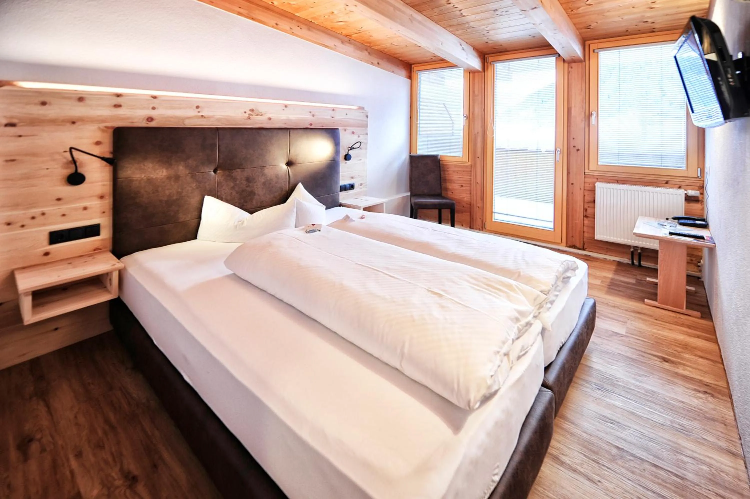 Photo of the whole room, Bed in Alpen Boutique Hotel Alpetta