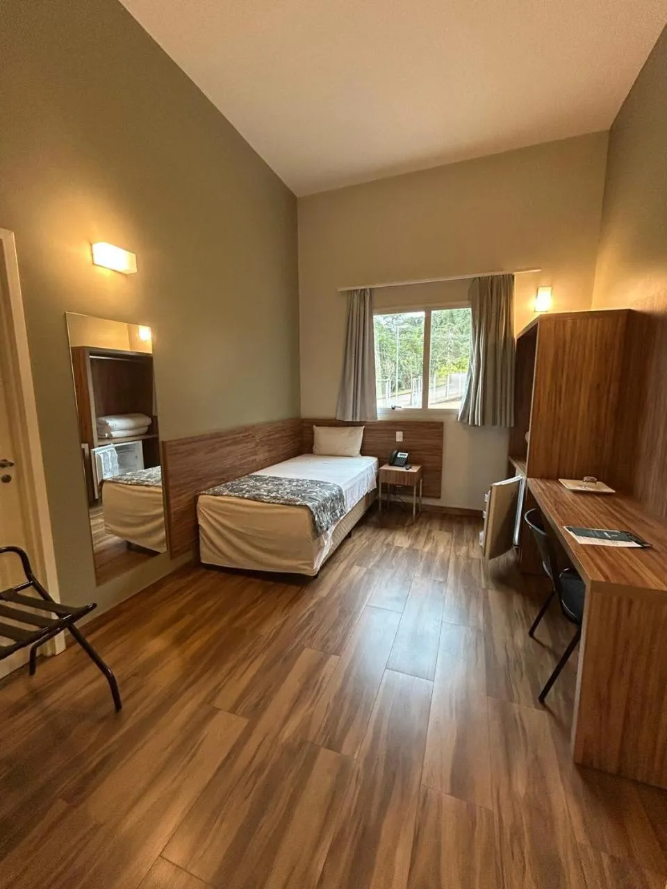 Bedroom, Bed in Impar Suites Barao de Cocais