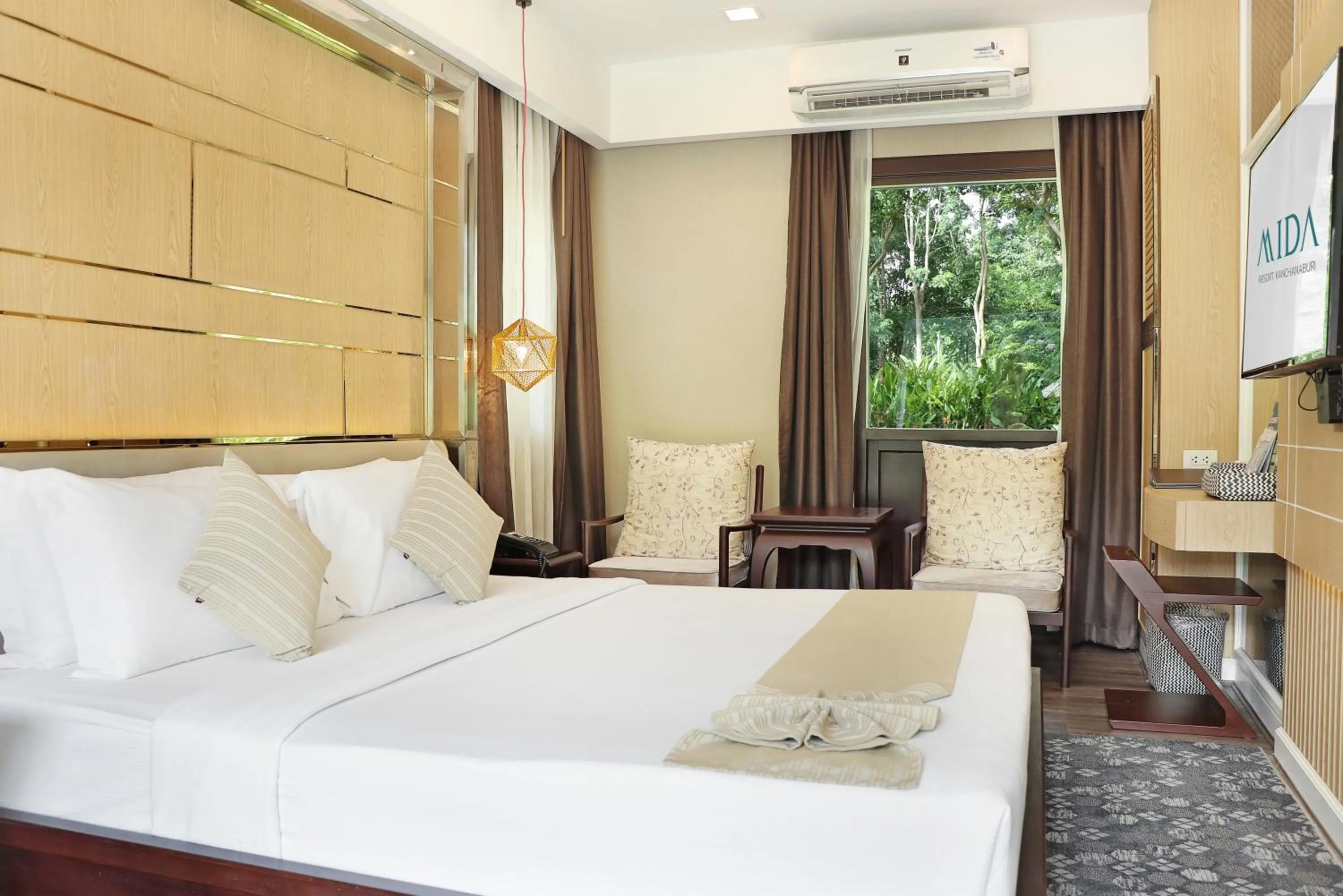 Bed in Mida Resort Kanchanaburi - SHA PLUS