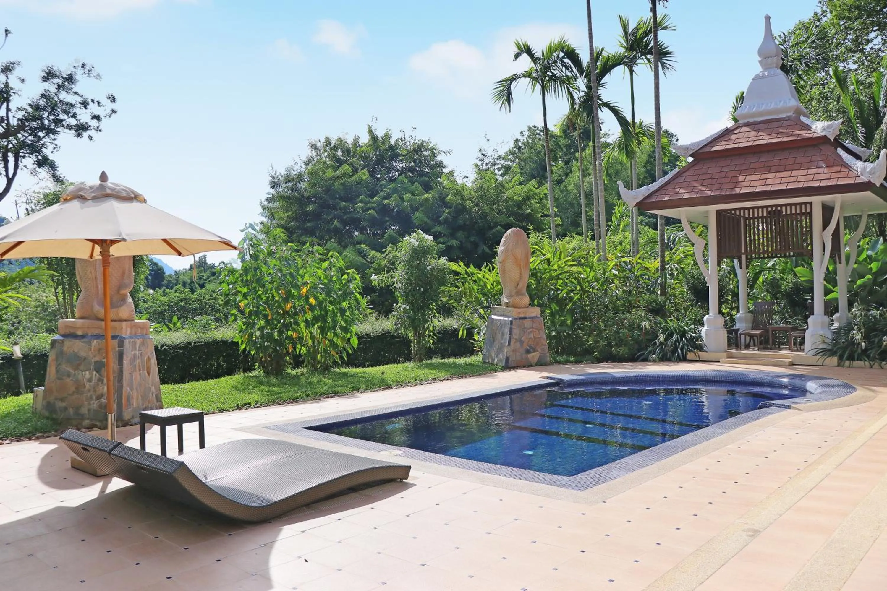 Swimming pool in Mida Resort Kanchanaburi - SHA PLUS