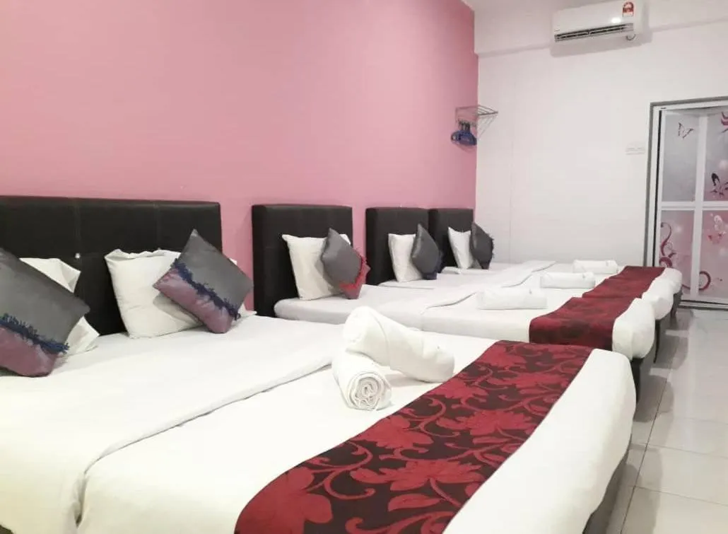 Bed in Max Ferringhi Hotel