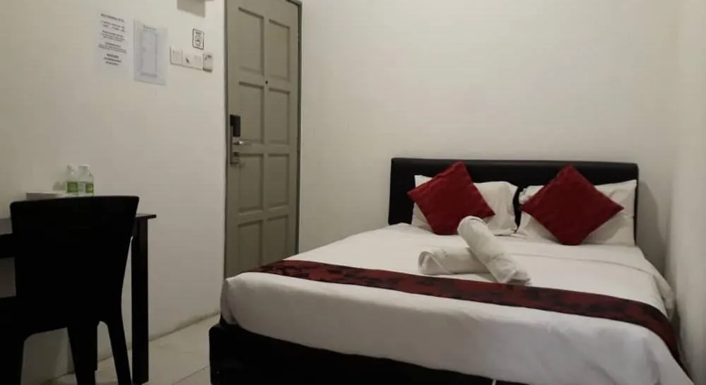 Bed in Max Ferringhi Hotel