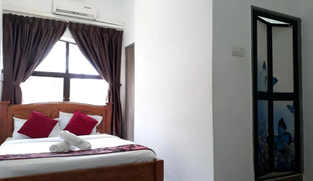 Bed in Max Ferringhi Hotel