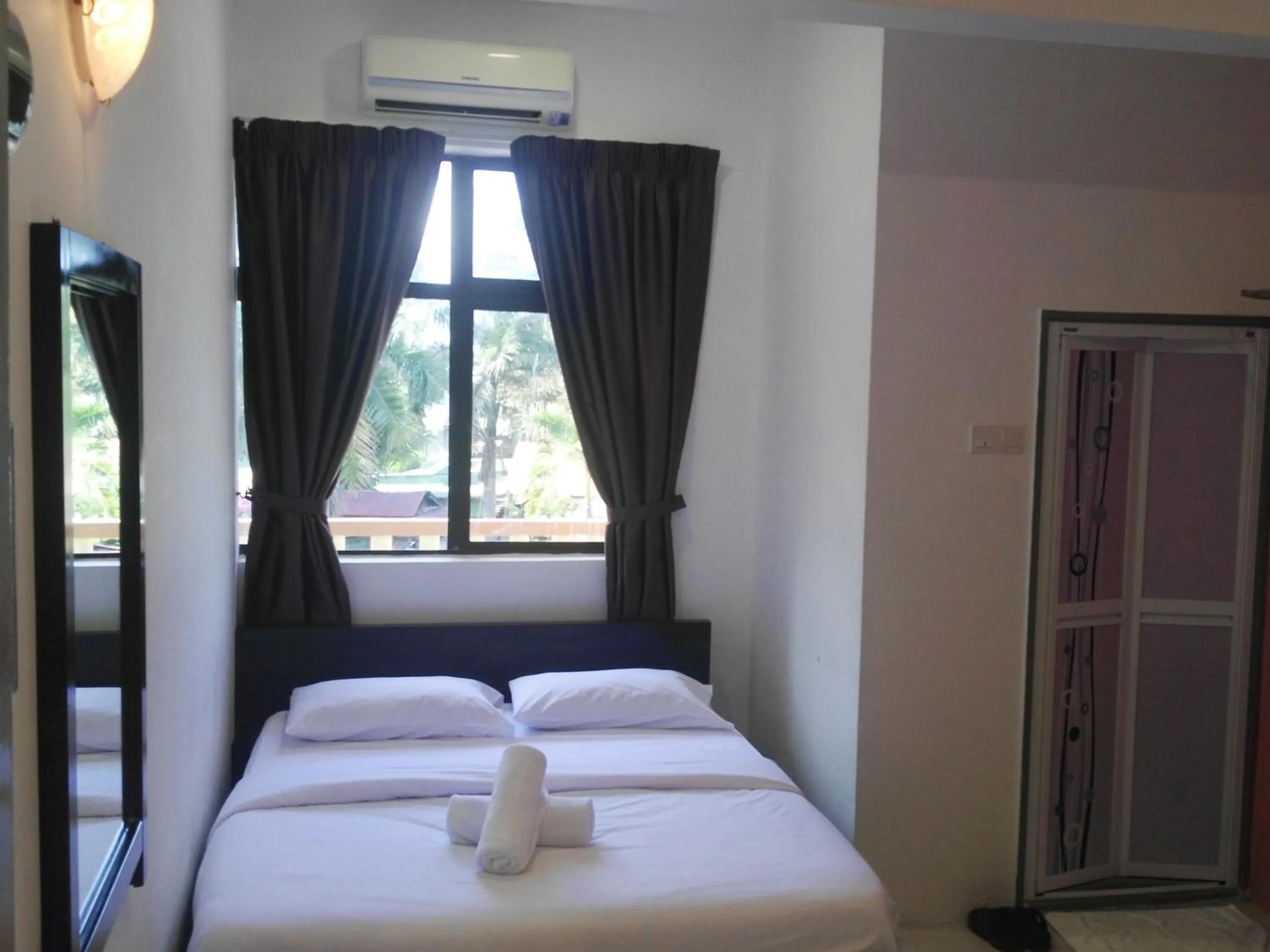 Bed in Max Ferringhi Hotel