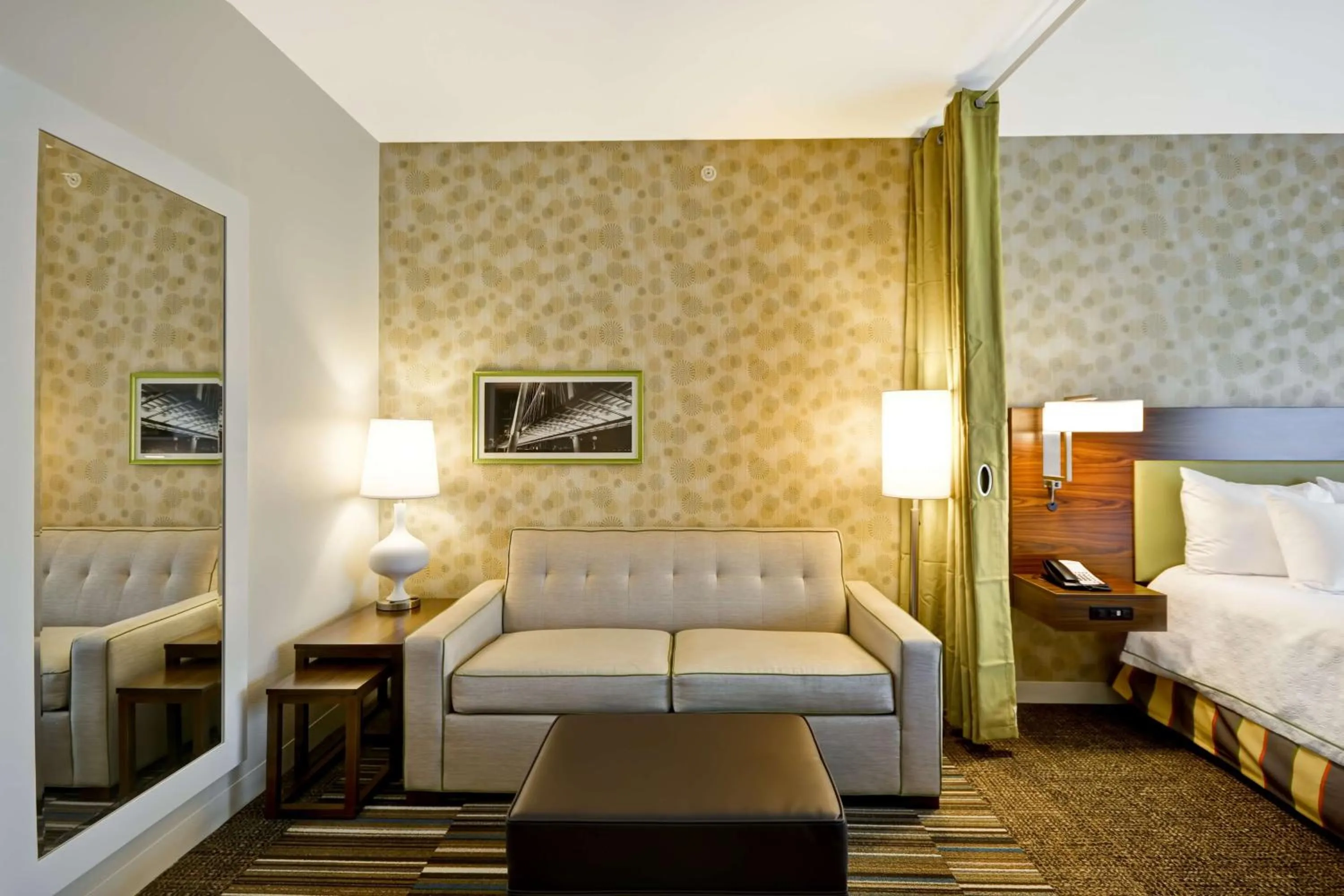 Living room, Bed in Home2 Suites by Hilton Dallas Downtown at Baylor Scott & White