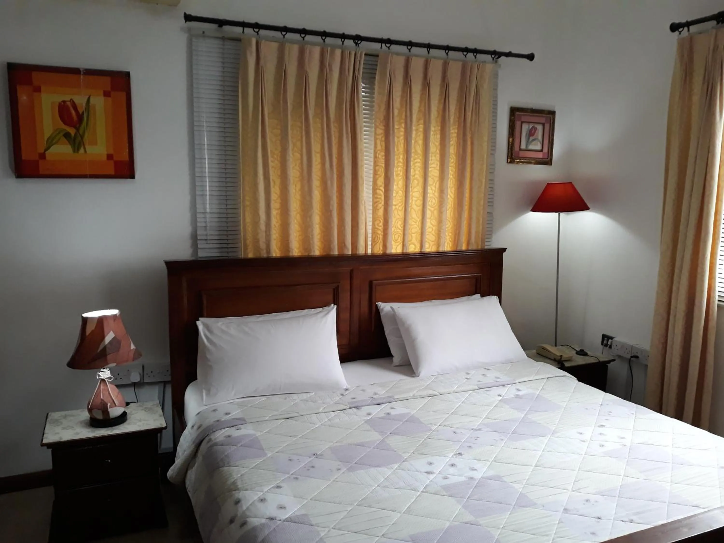 Bed in Lavender Lodge Hotel