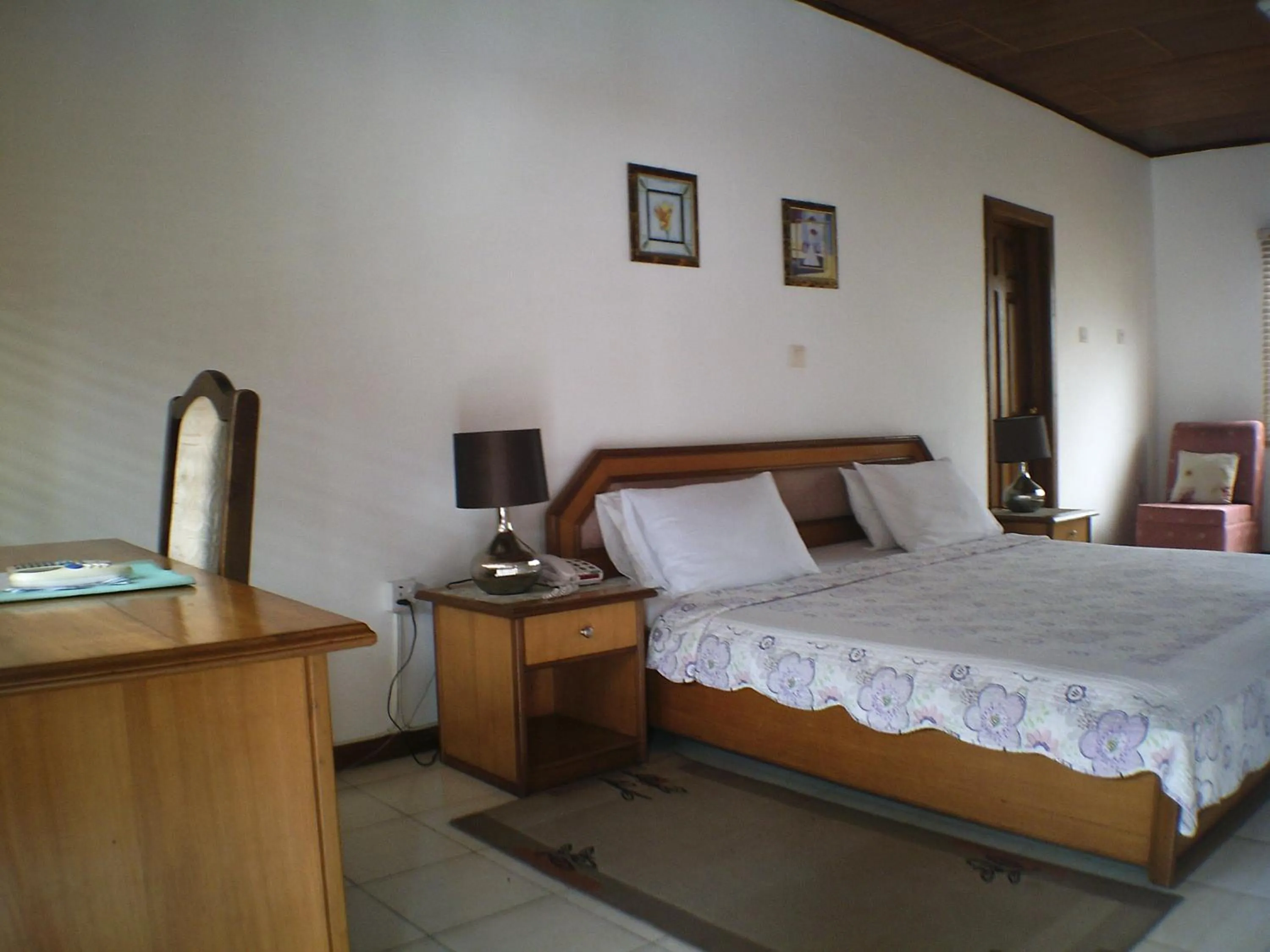 Bed in Lavender Lodge Hotel