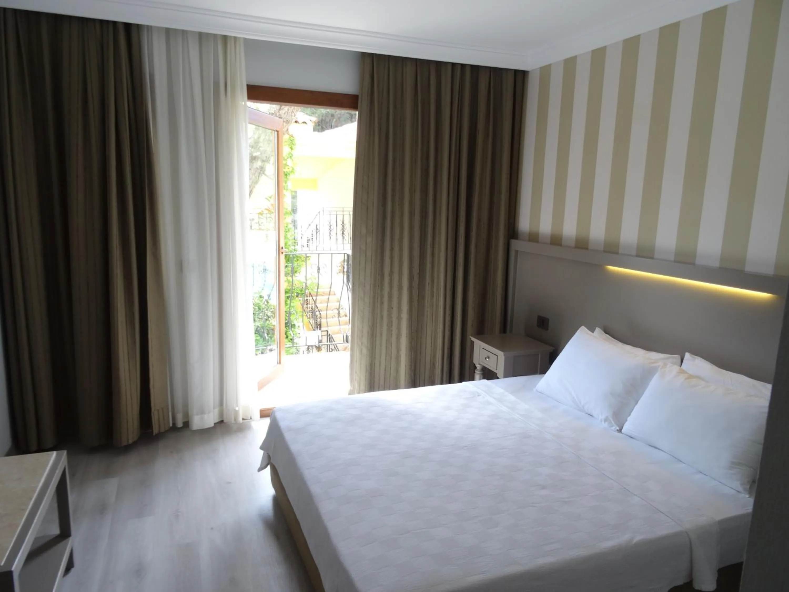 Photo of the whole room, Bed in Pine Valley Hotel Oludeniz