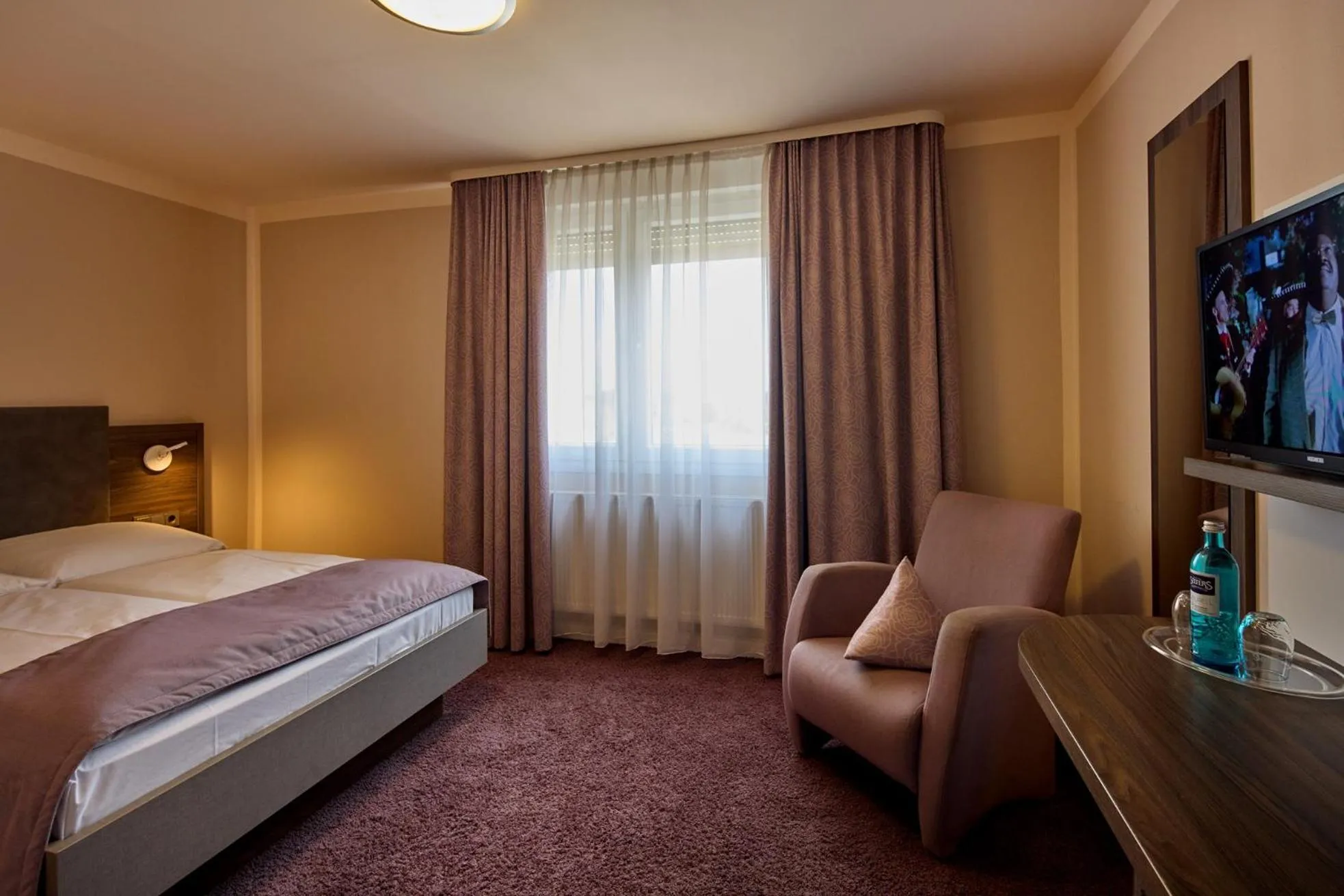Photo of the whole room, Bed in TRIP INN PostHotel Düren