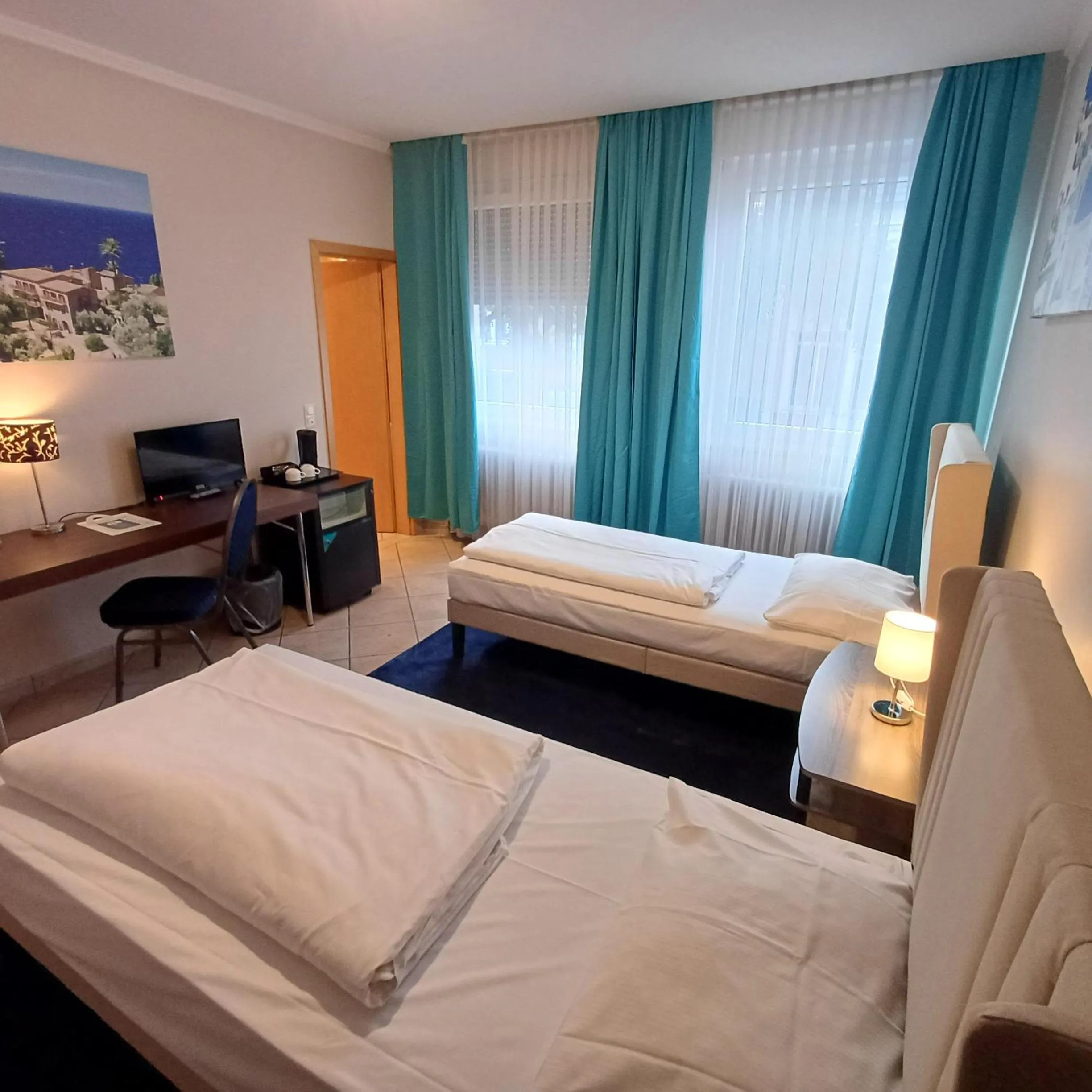 Photo of the whole room, Bed in TRIP INN PostHotel Düren