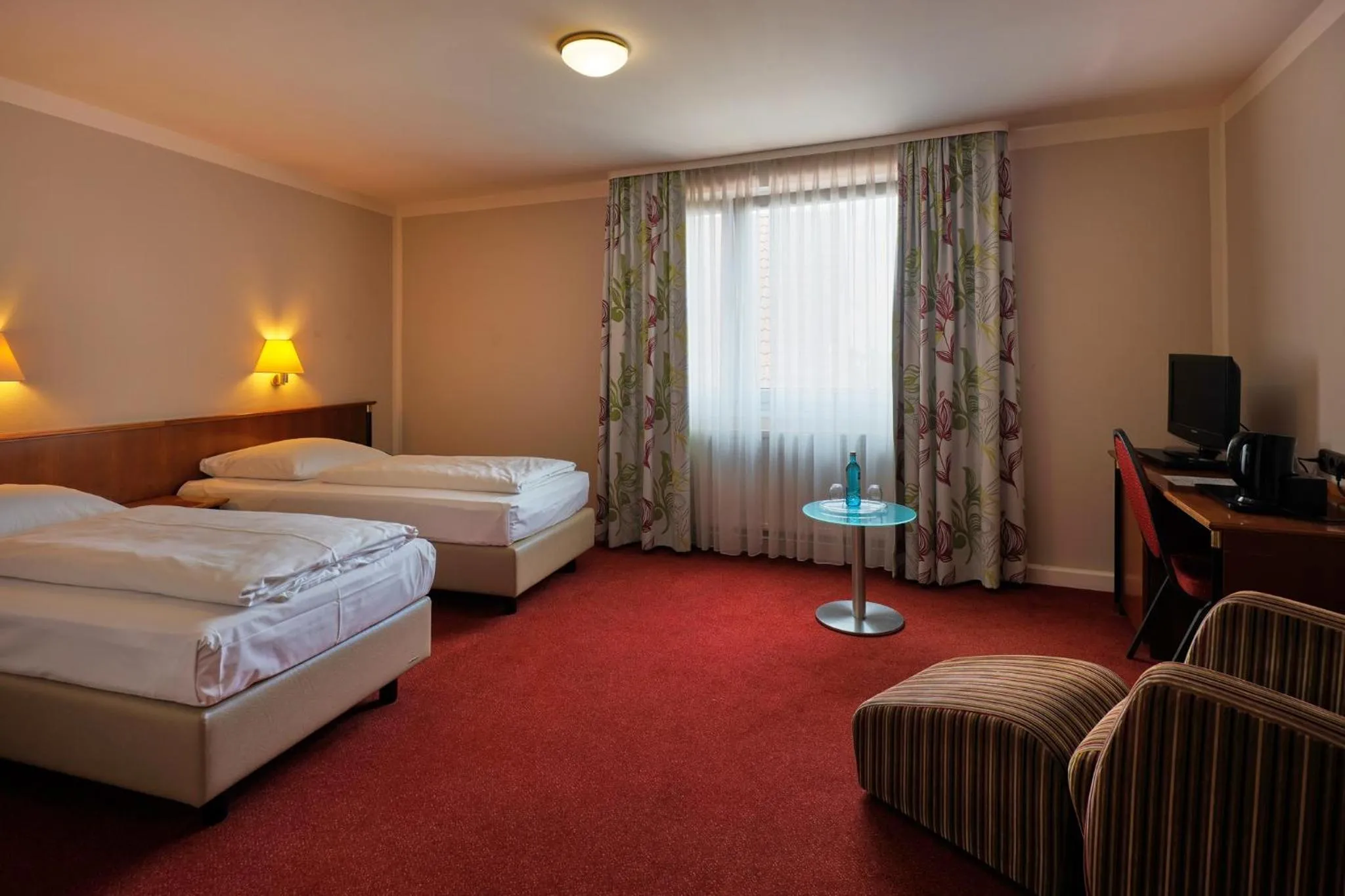 Photo of the whole room, Bed in TRIP INN PostHotel Düren