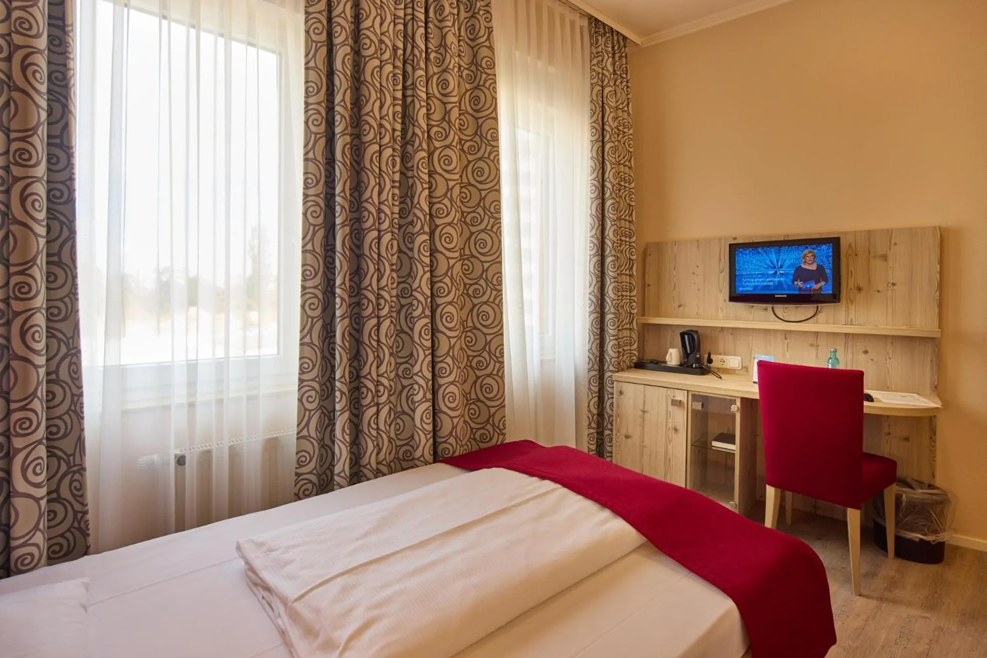 Photo of the whole room, Bed in TRIP INN PostHotel Düren