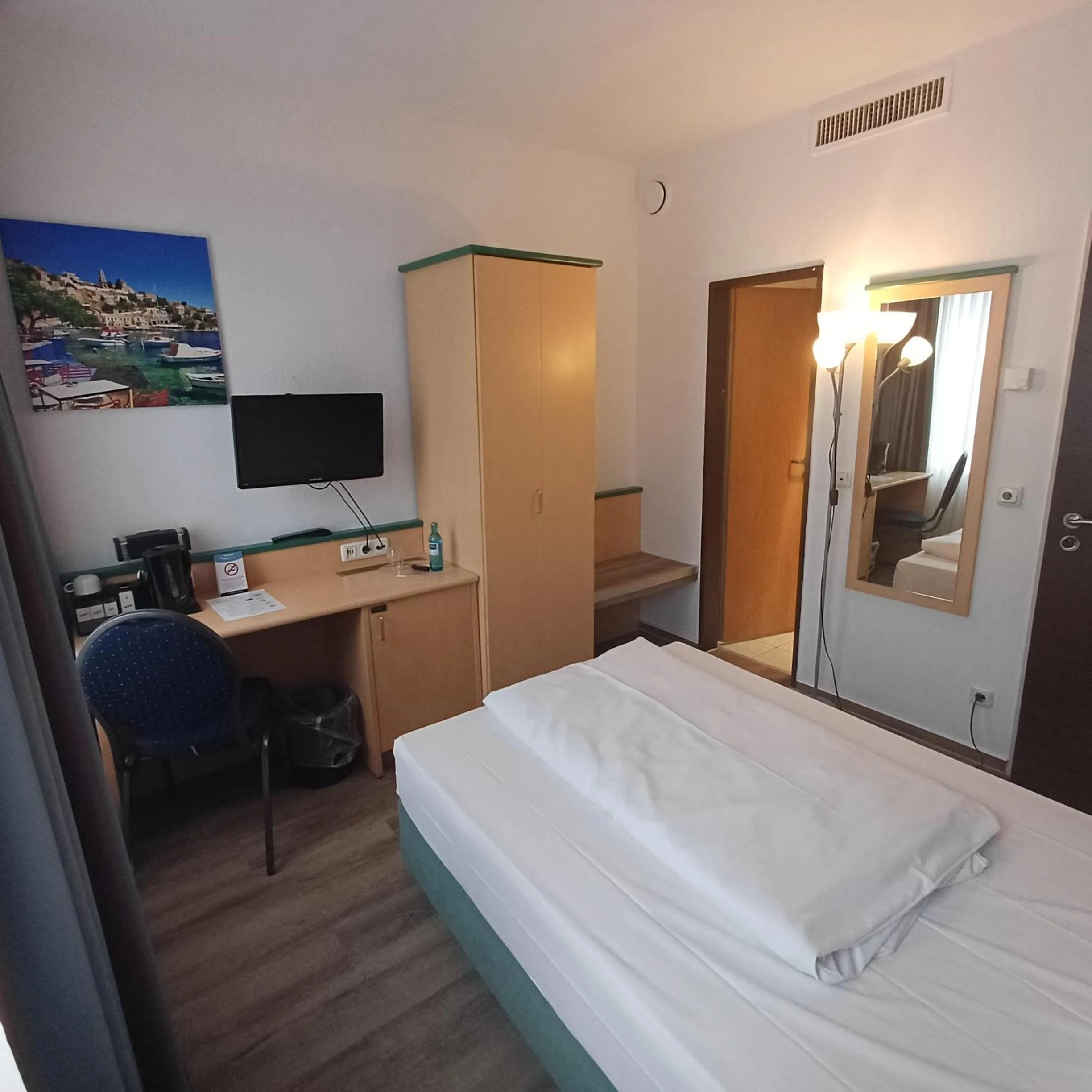 Photo of the whole room, Bed in TRIP INN PostHotel Düren