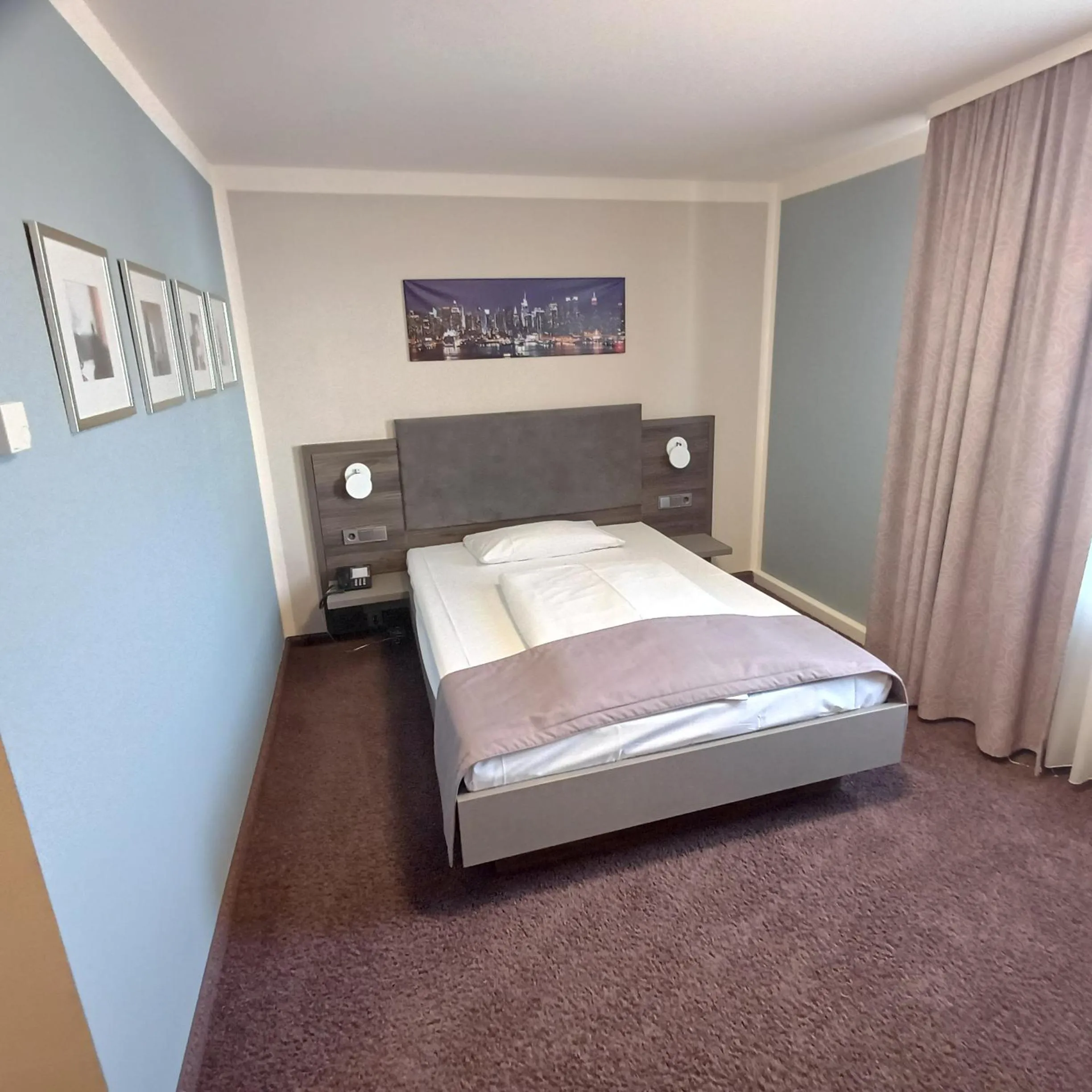 Photo of the whole room, Bed in TRIP INN PostHotel Düren