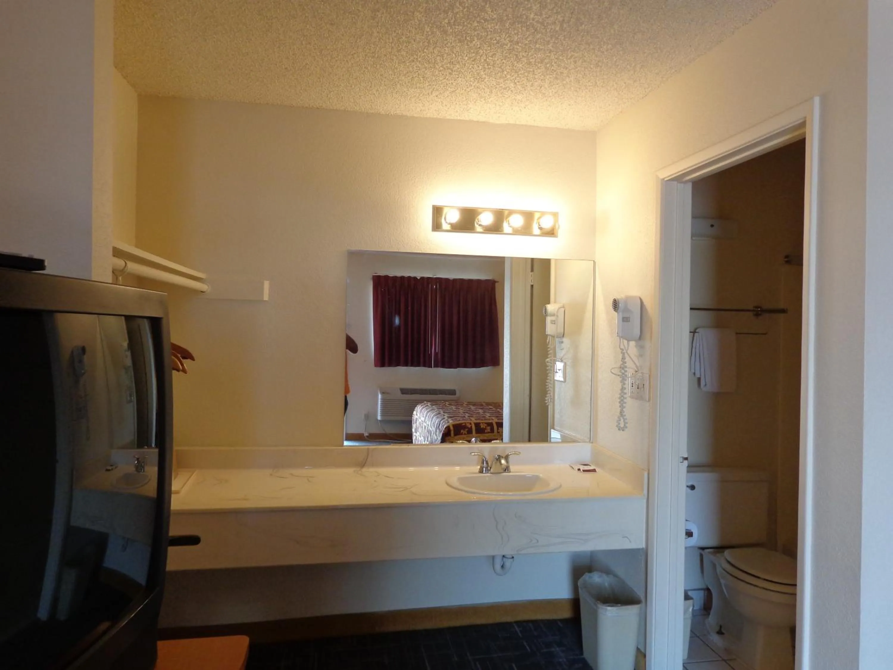 Bathroom in Knights Inn Phoenix at N Black Canyon Hwy