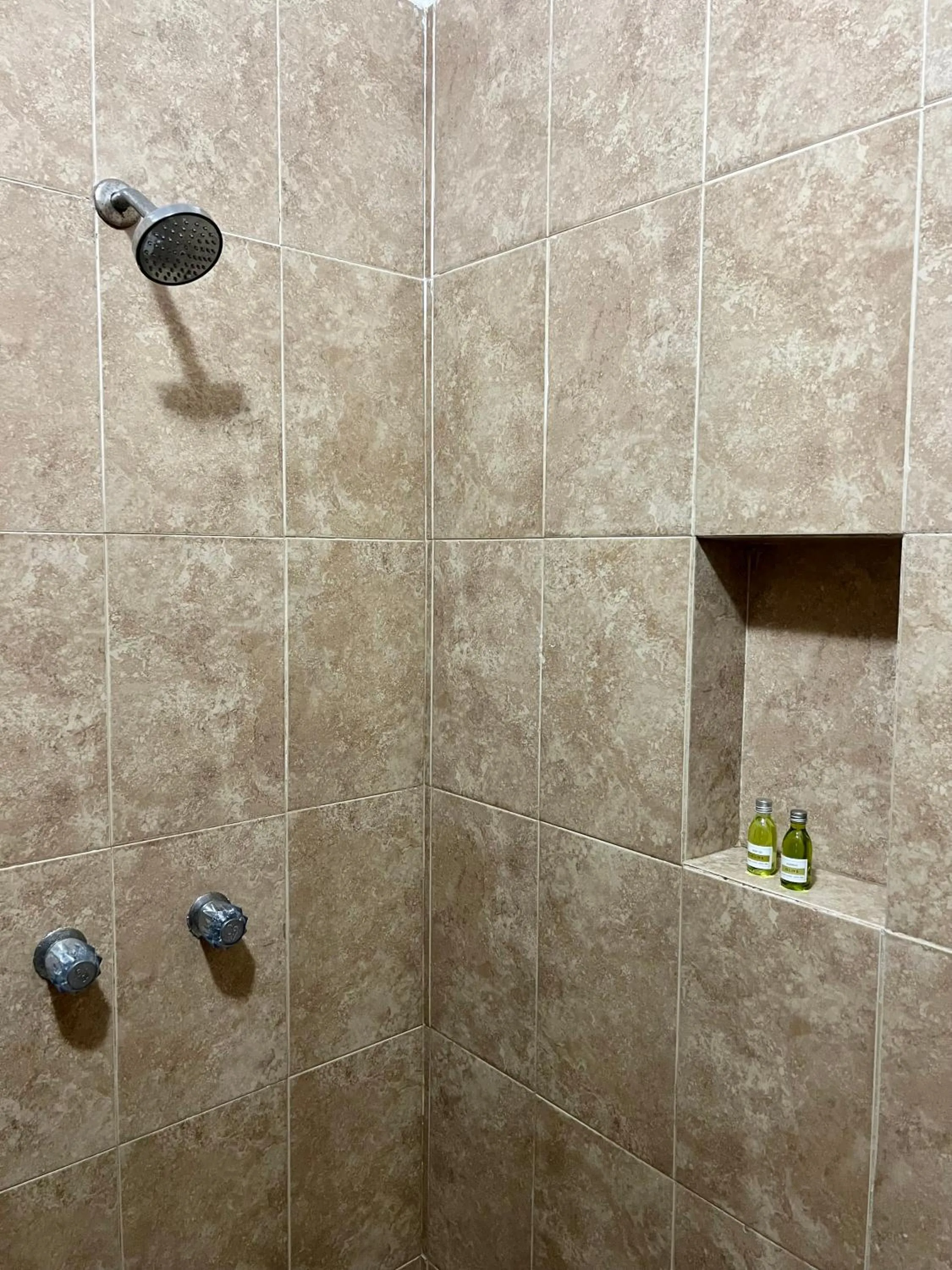 Shower in Pelicano Inn Playa del Carmen - Beachfront Hotel