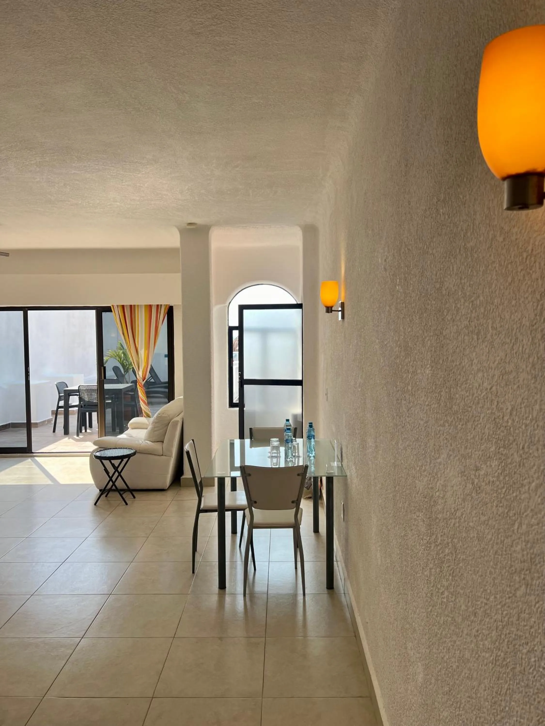 Seating area in Pelicano Inn Playa del Carmen - Beachfront Hotel