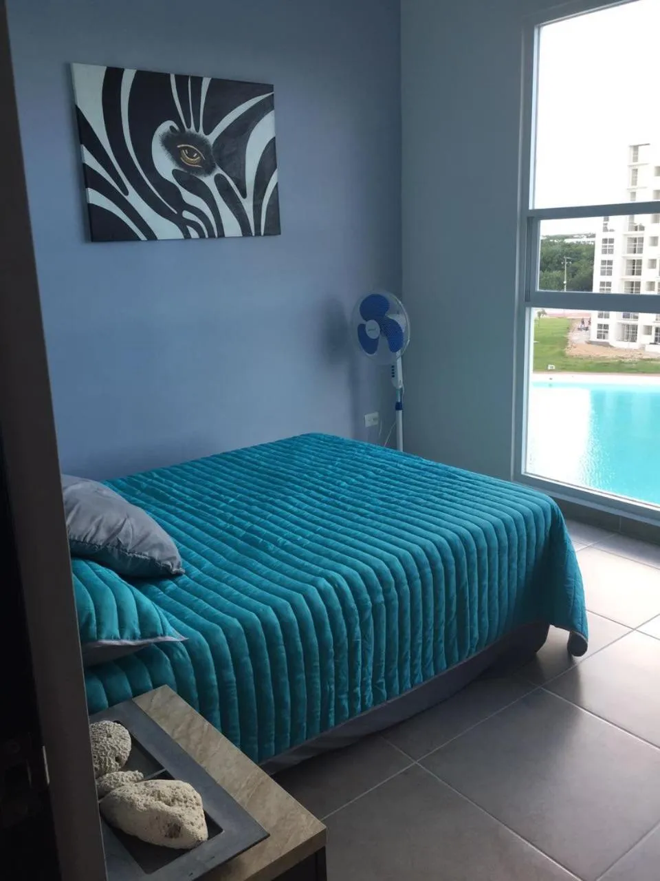 Living room, Bed in Departamento en Dream Lagoons Cancun