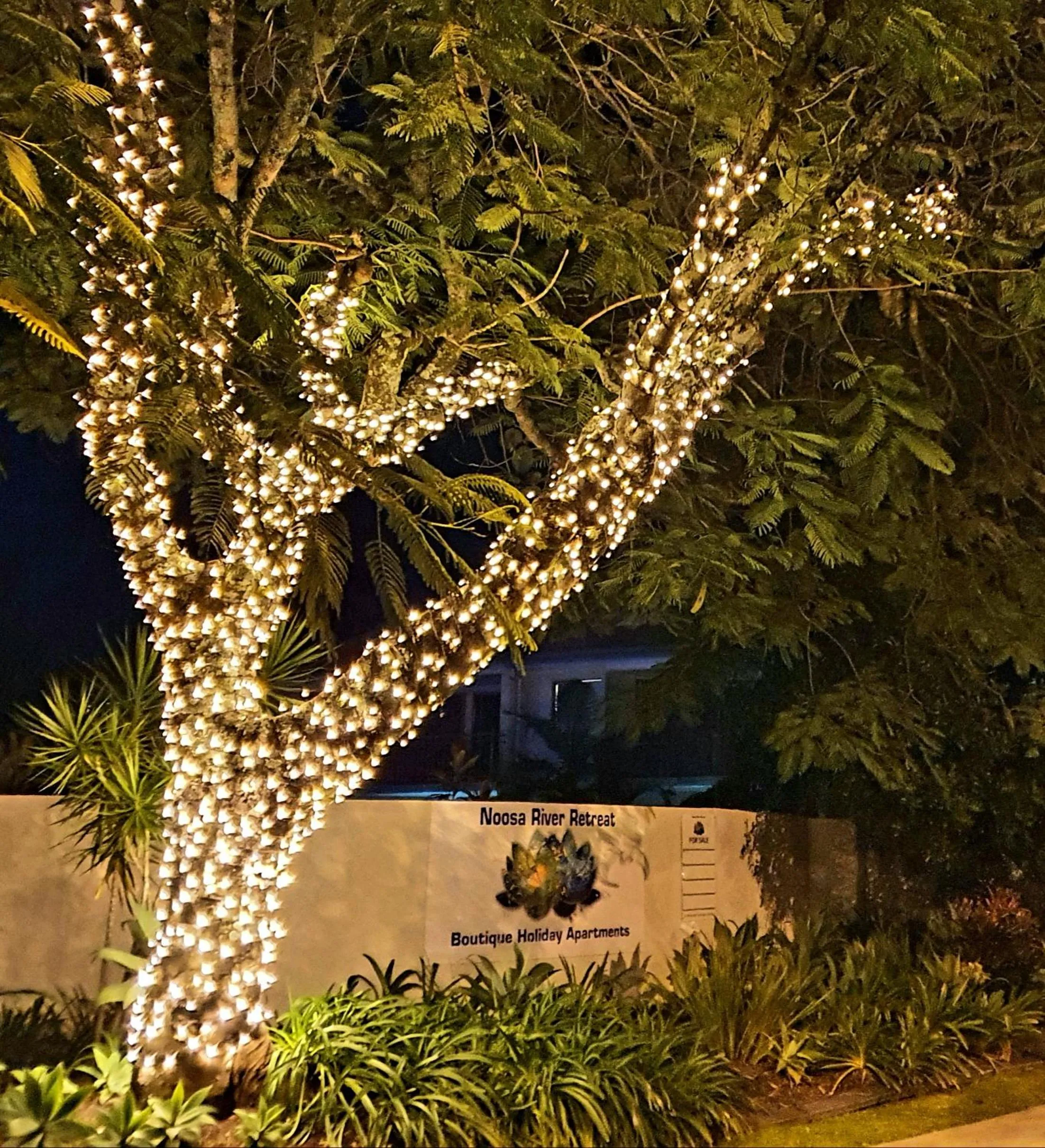 Property logo or sign in Noosa River Retreat Holiday Apartments