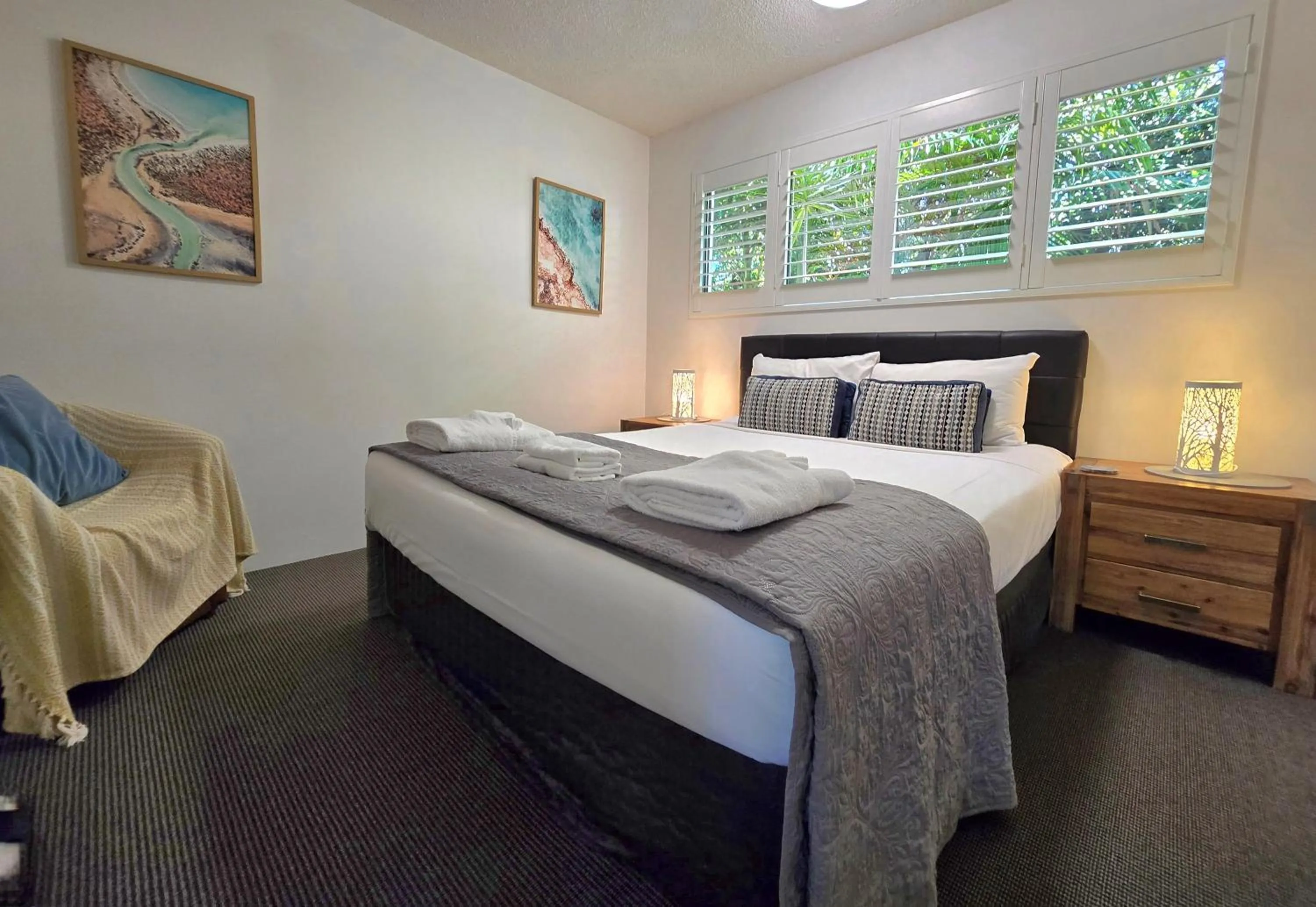 Bed in Noosa River Retreat Holiday Apartments