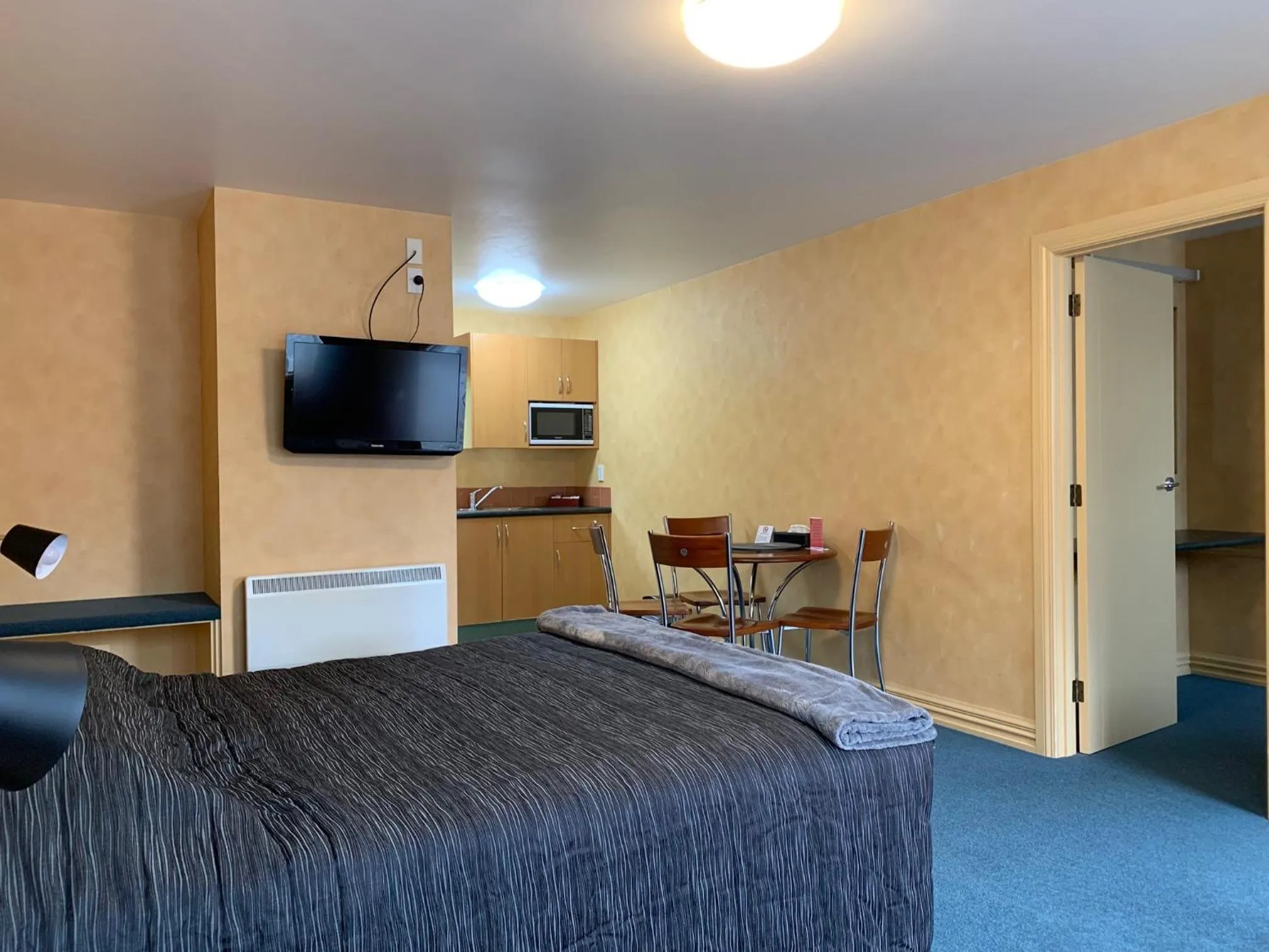 Bed in Red Tussock Motel