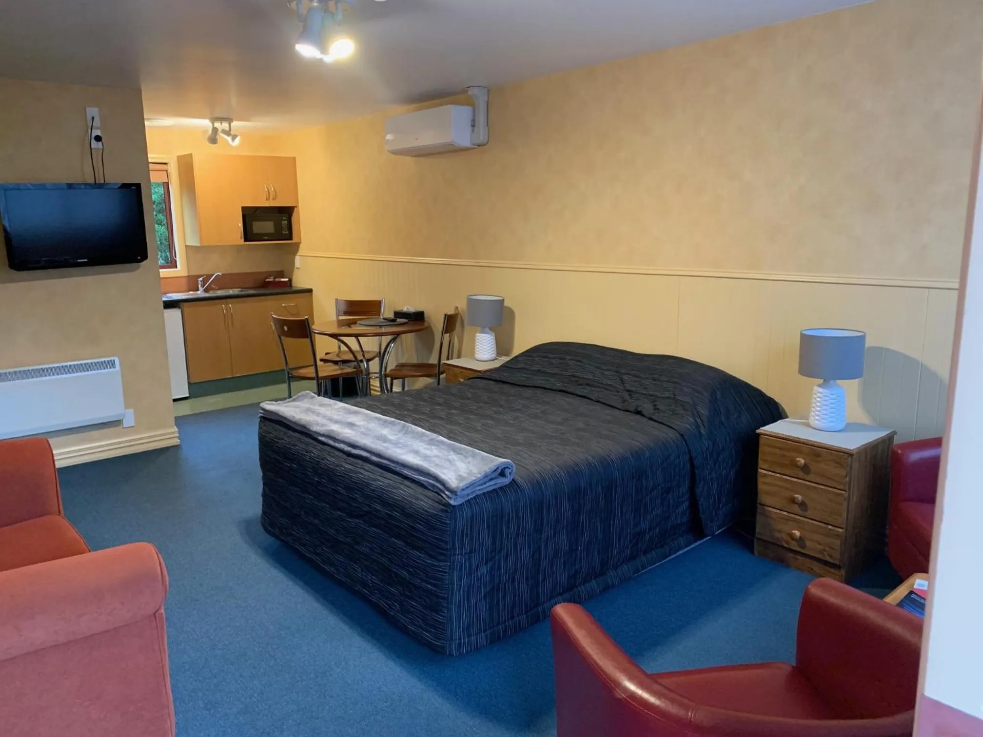 Bed in Red Tussock Motel