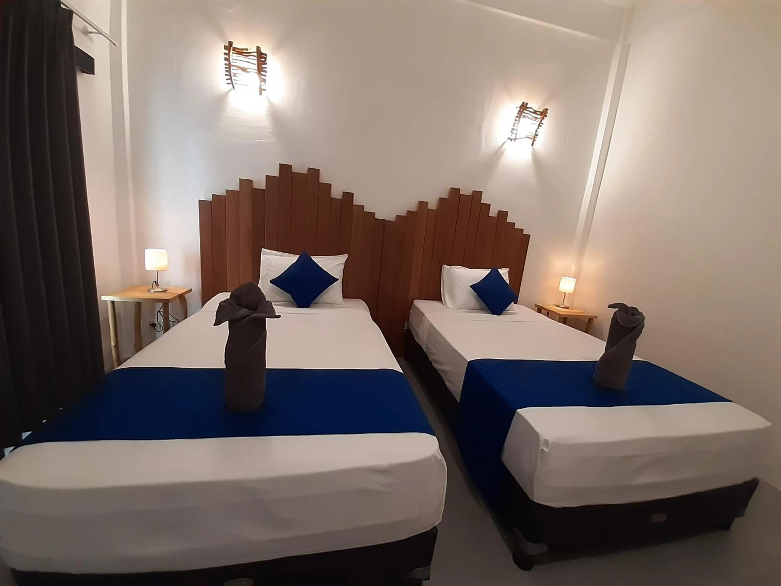 Bed in Living Trawangan Hotel