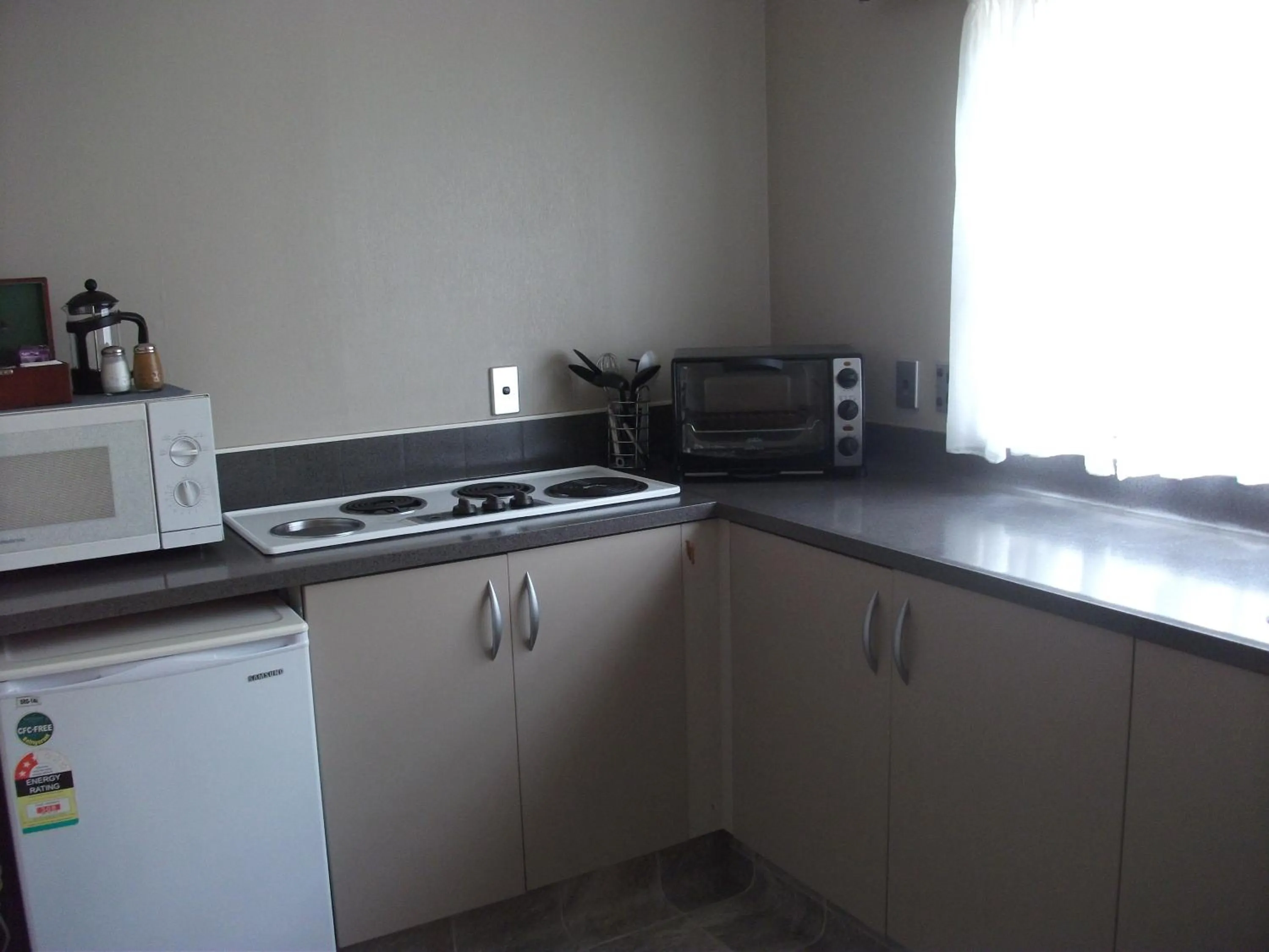 Kitchen or kitchenette in Aquarius Motor Inn