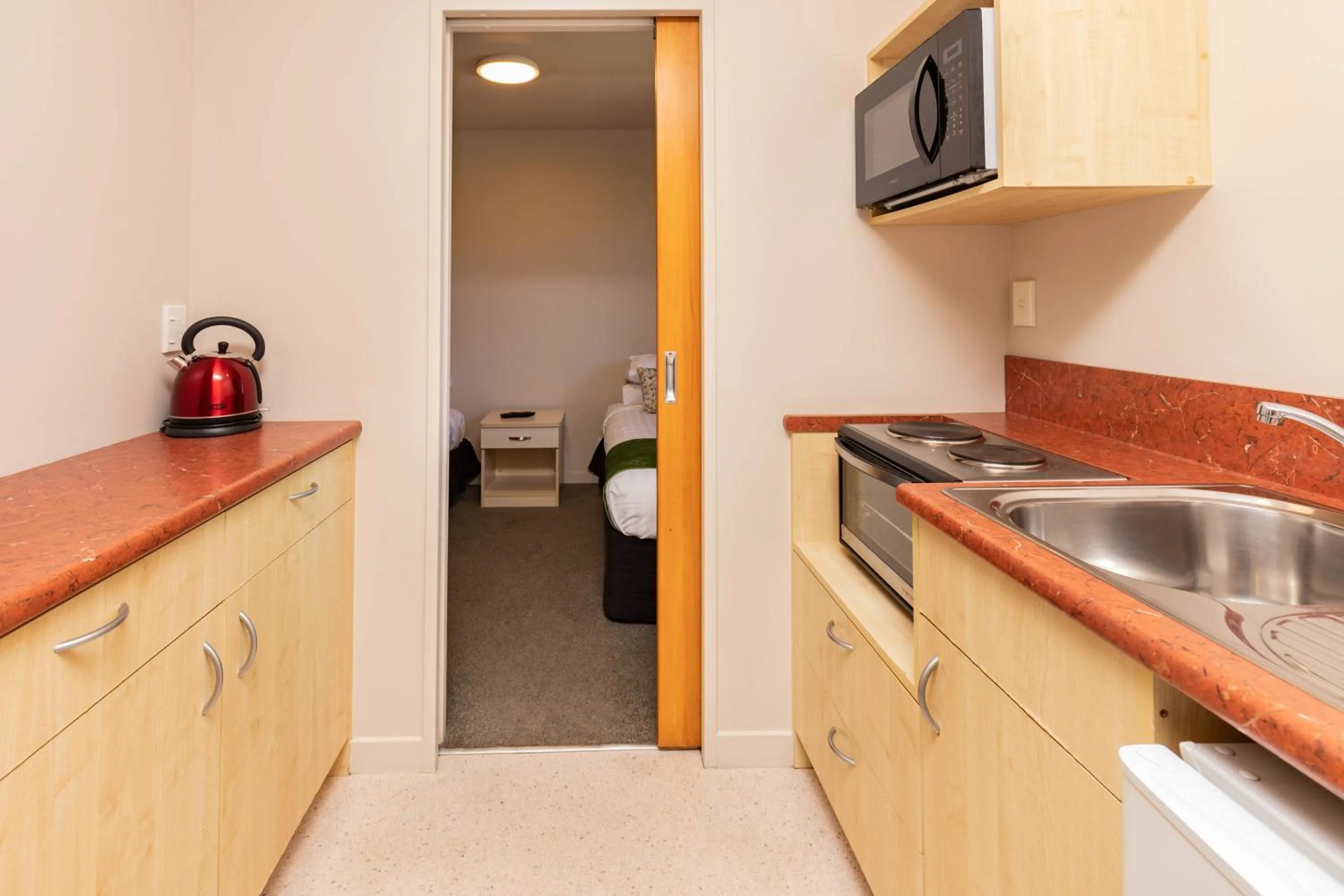 Kitchen or kitchenette in Bella Vista Motel Greymouth