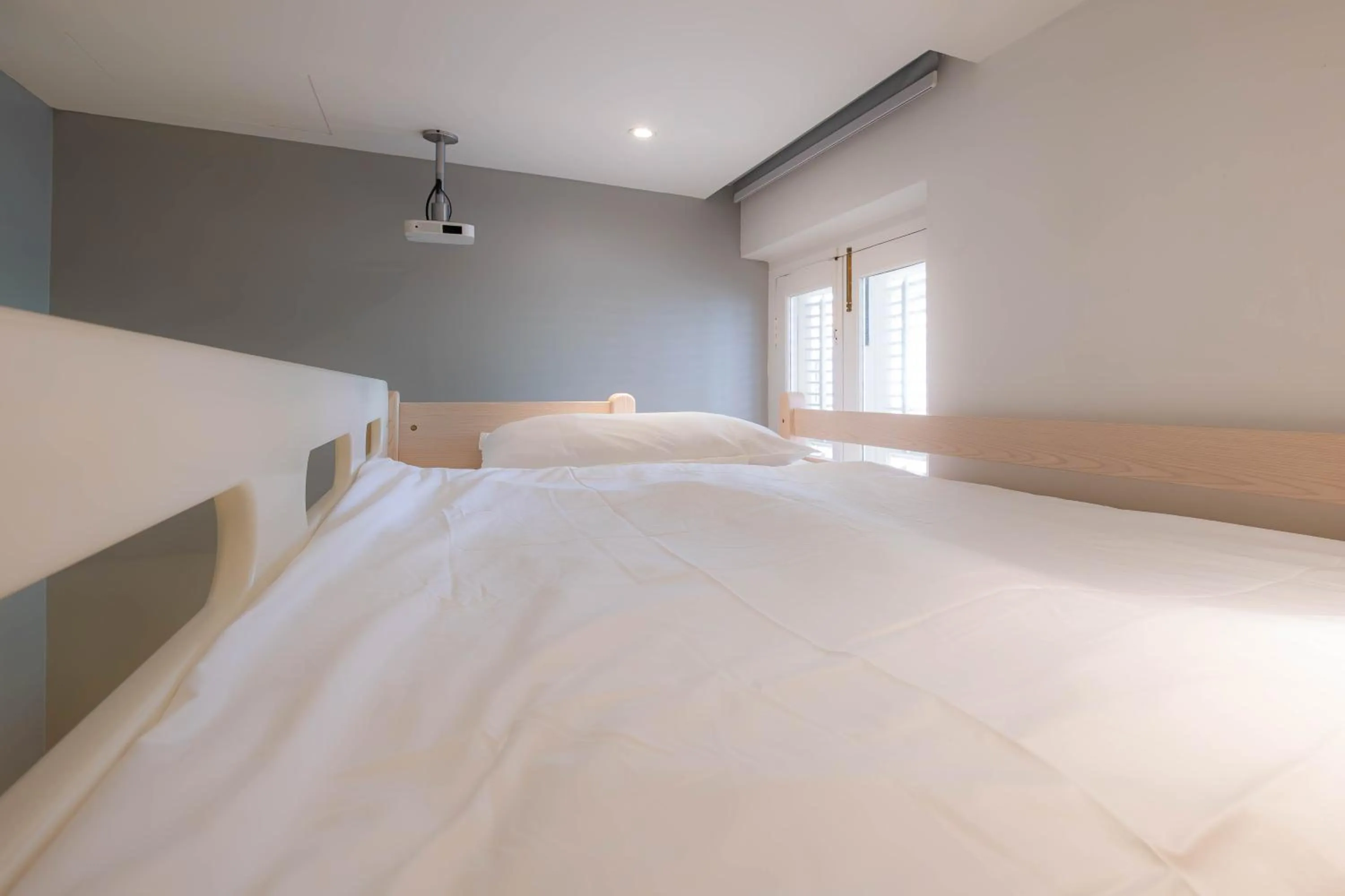 Bed in Rest Chinatown Hotel