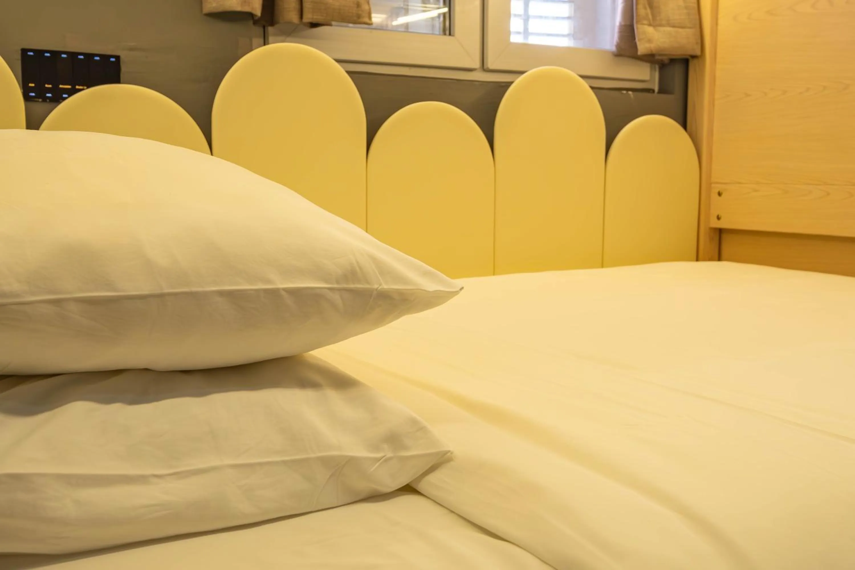 Bed in Rest Chinatown Hotel