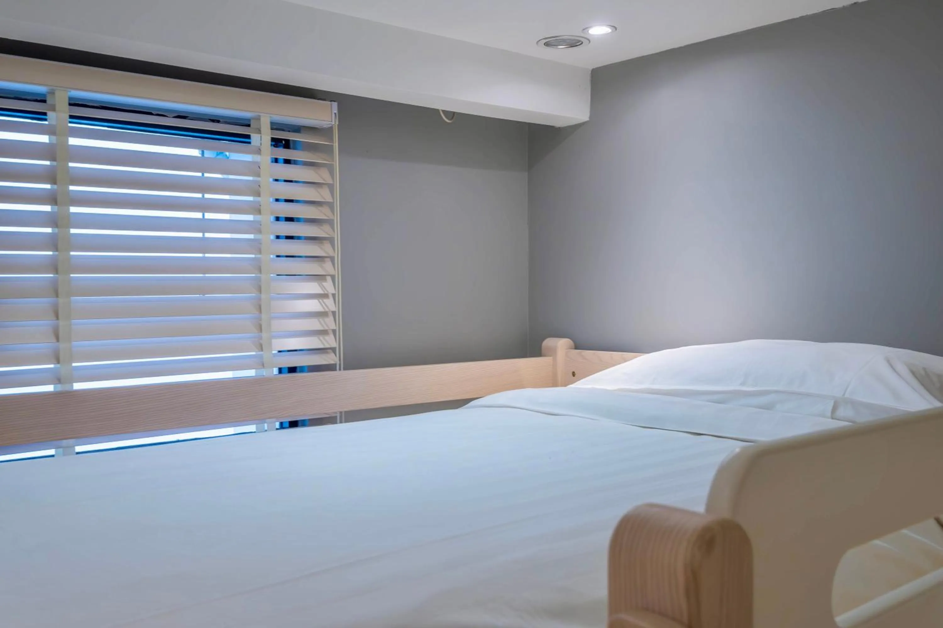 Bed in Rest Chinatown Hotel