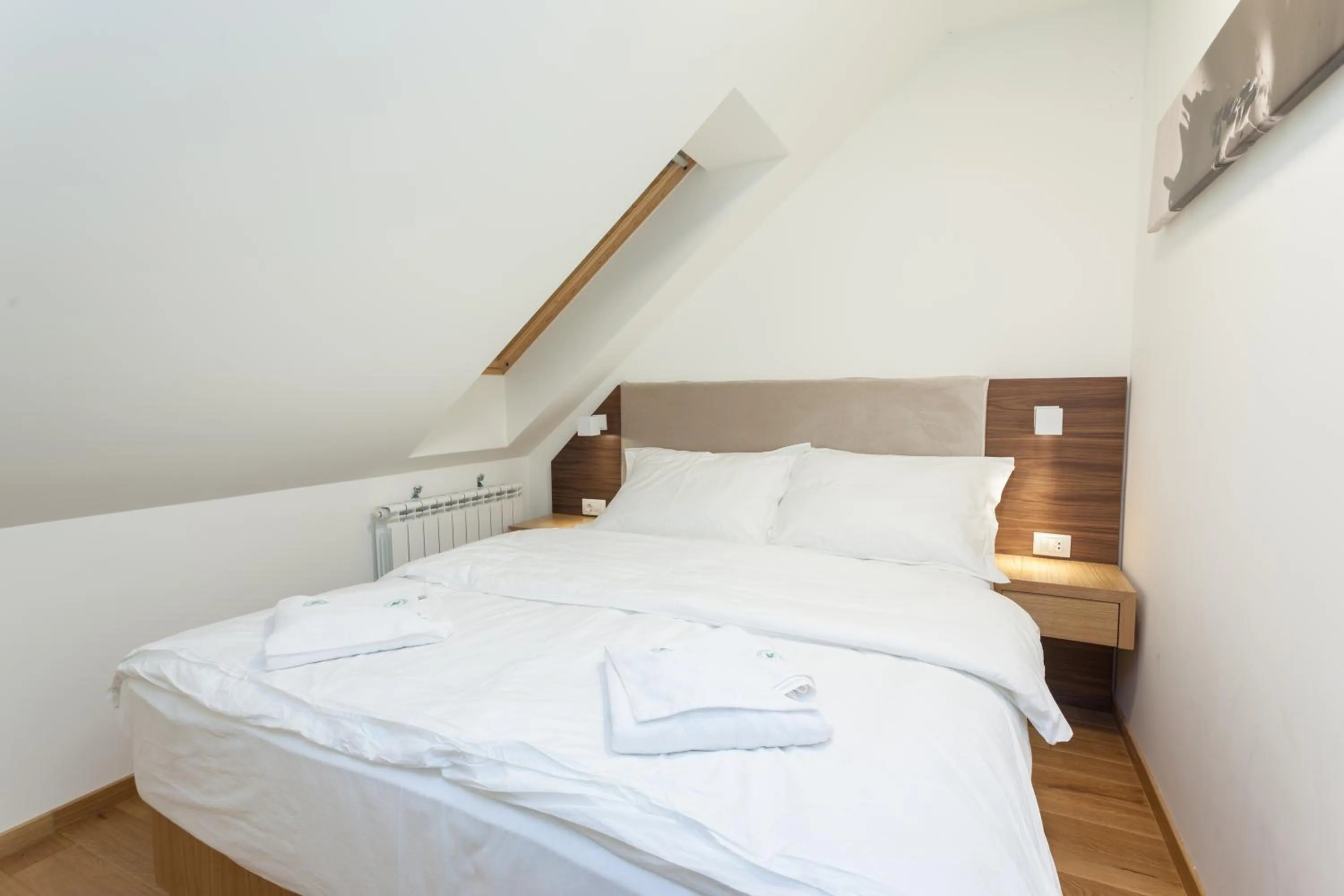 Bed in Vila Apartments Wellness&Spa