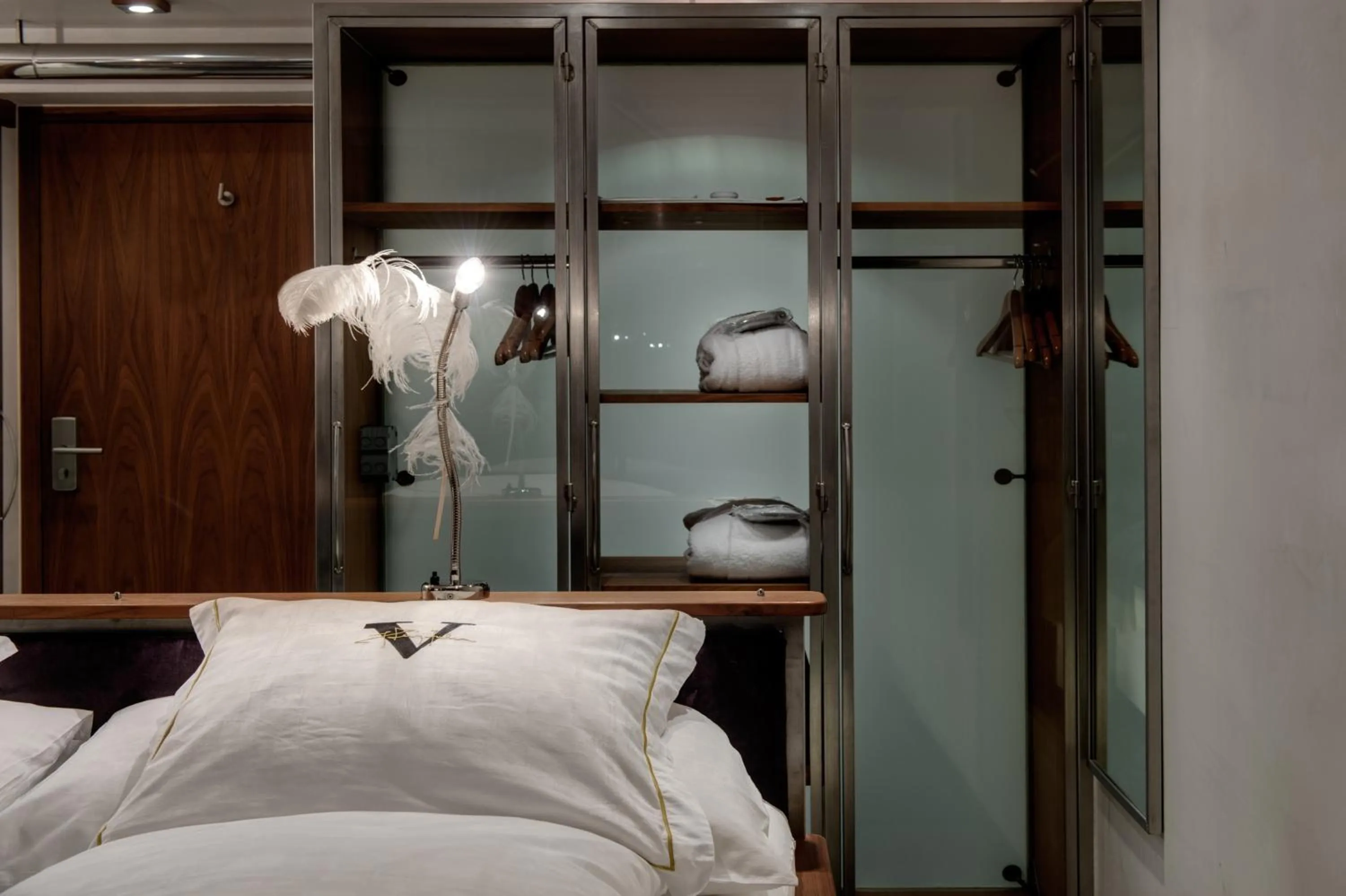 Bed in Backstage Boutique SPA Hotel