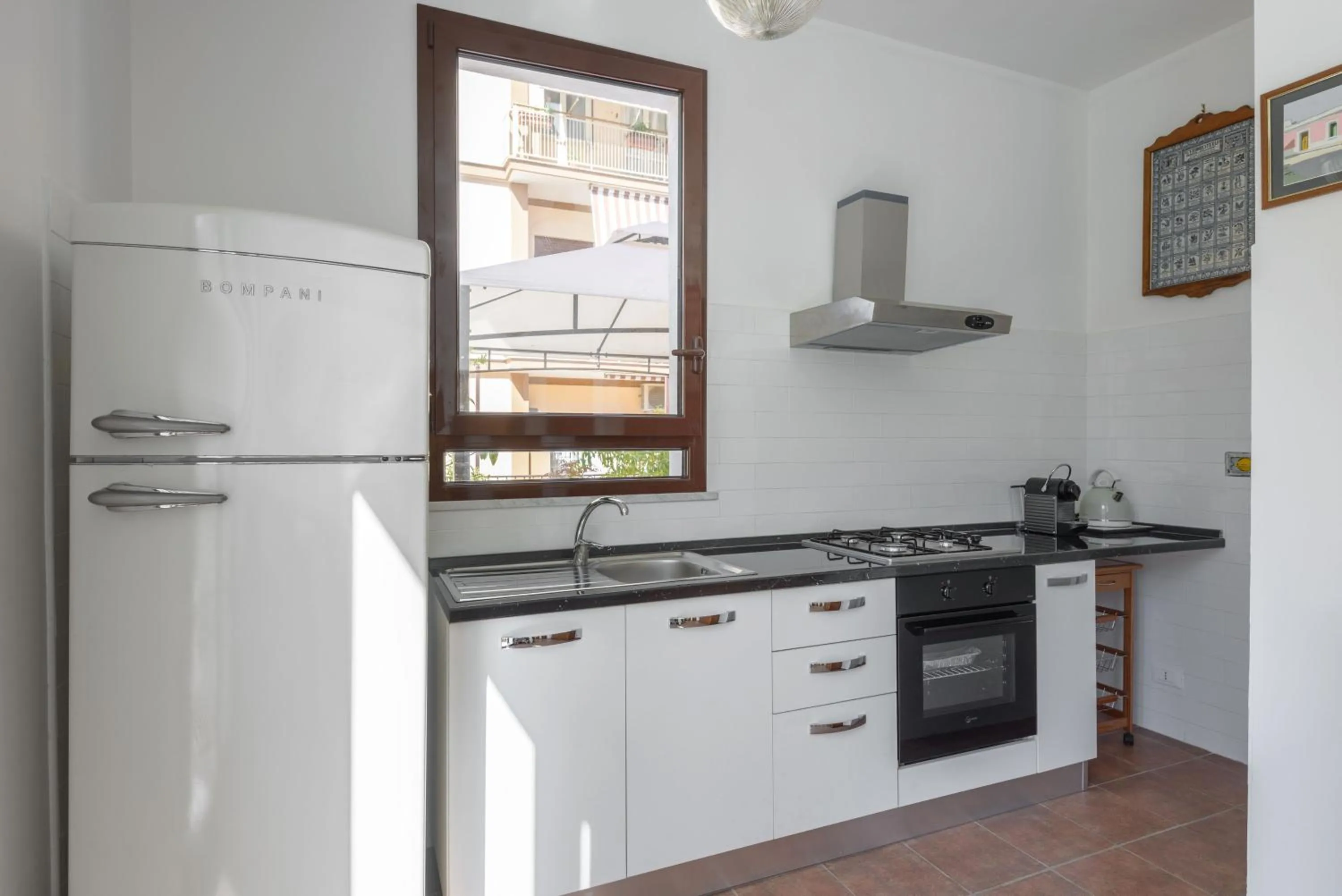 Communal kitchen in Cornelia Penthouse