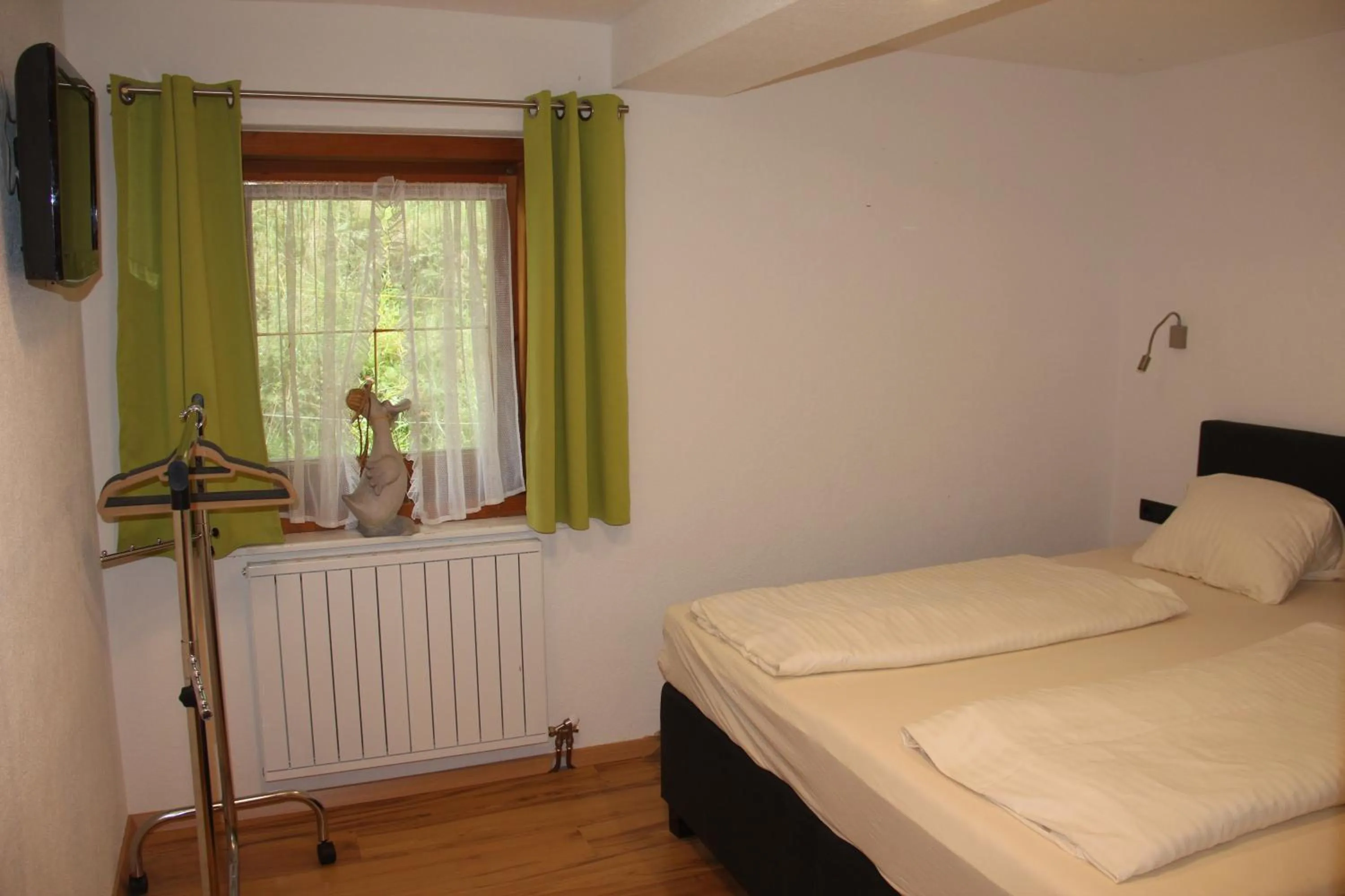 Bed in Hotel Schweizerhof