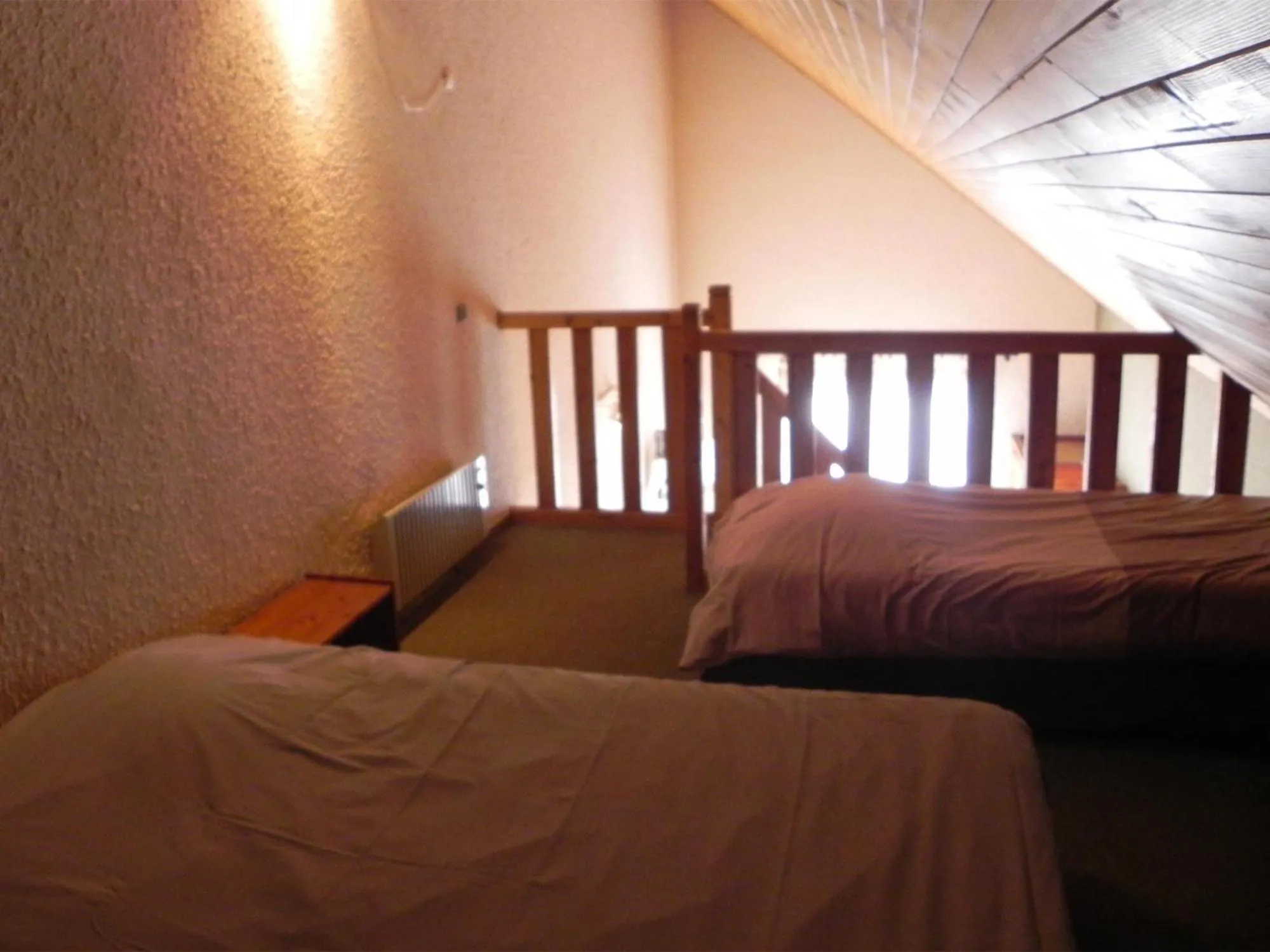 Bed in Hôtel Résidence Les Colchiques