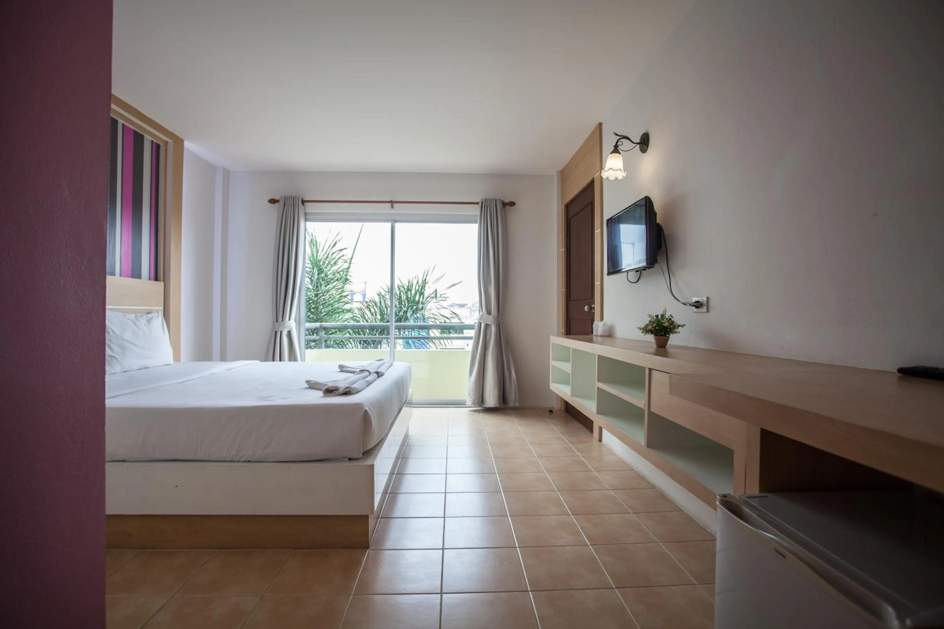 Bedroom in The Greenery Hotel