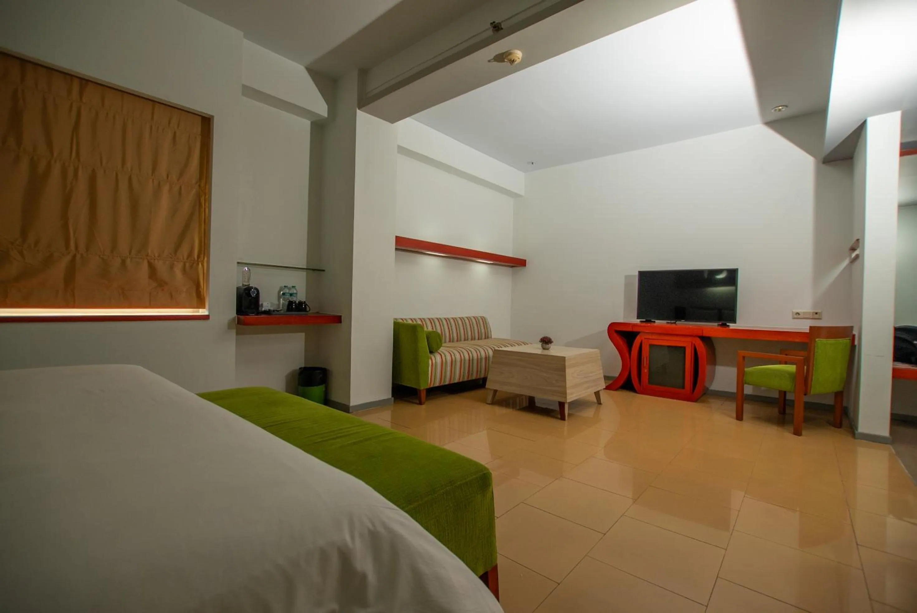 Living room, Bed in Sparks Life Jakarta, ARTOTEL Curated