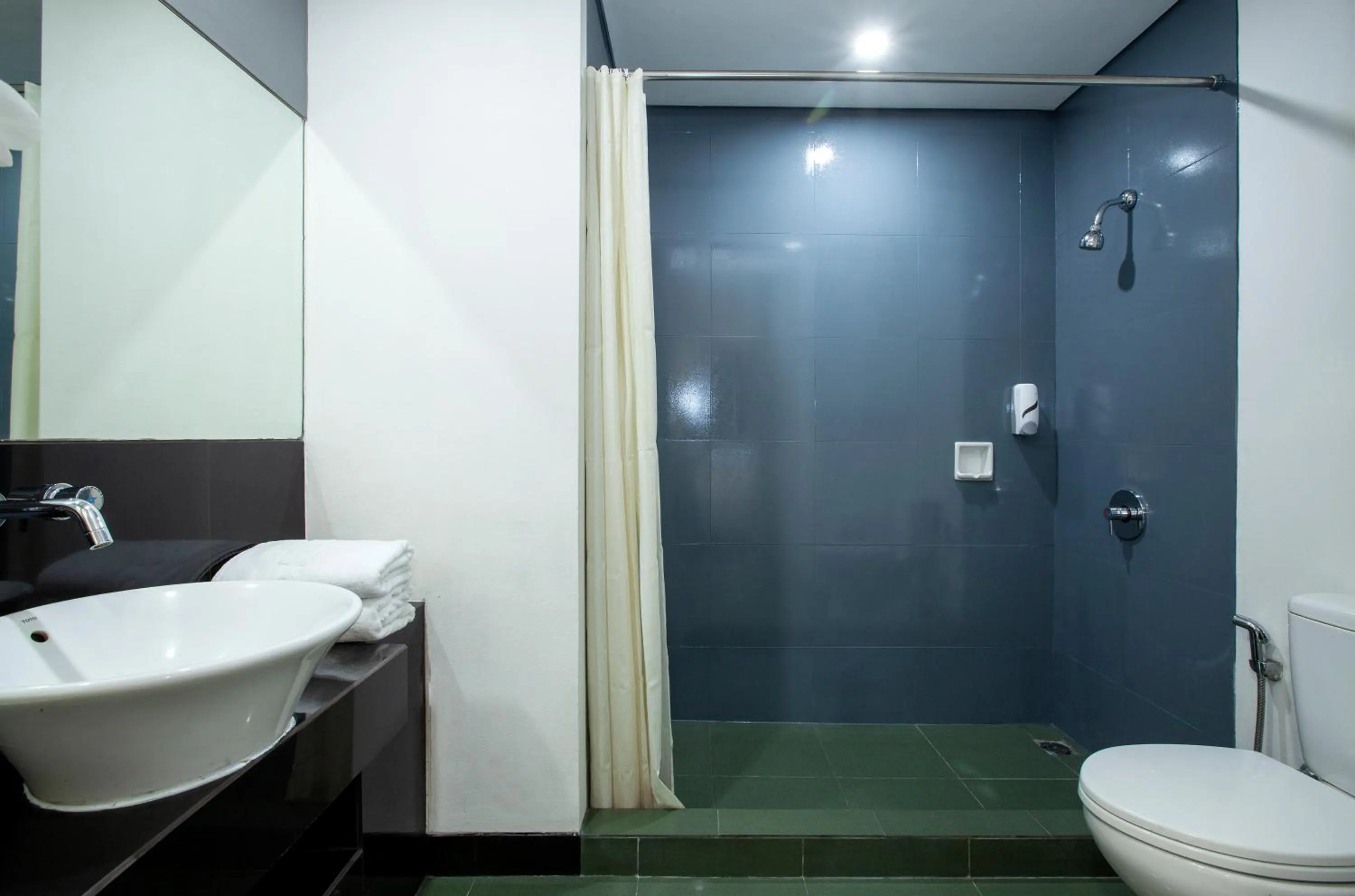 Bathroom in Sparks Life Jakarta, ARTOTEL Curated