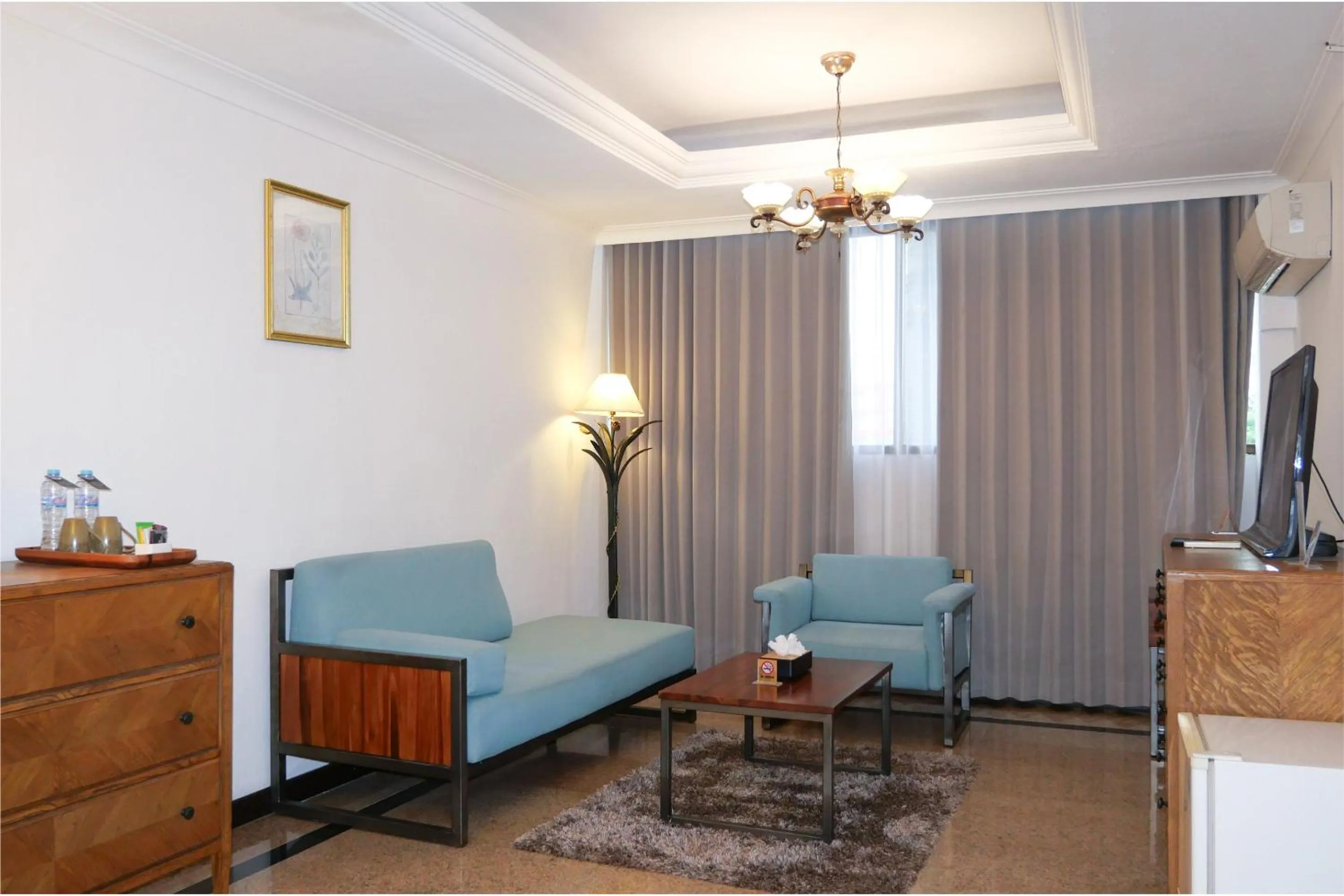 Living room in Metro Park View Hotel Kota Lama Semarang