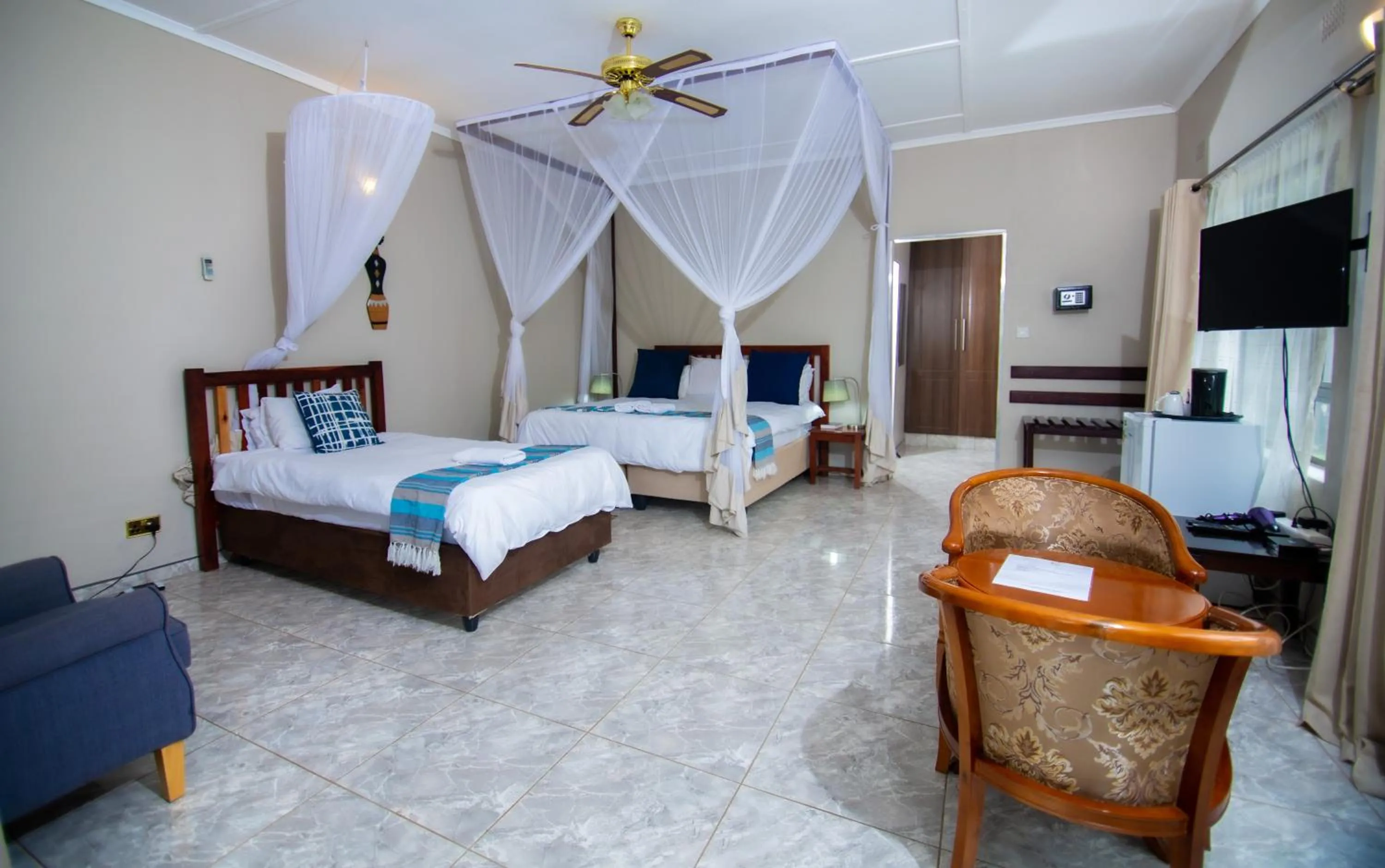 Bed in Dzimbahwe Guest Lodge