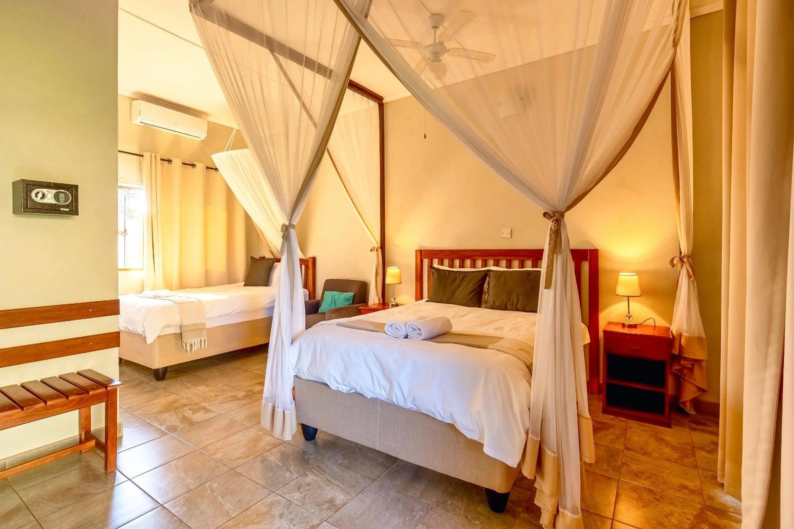 Photo of the whole room, Bed in Dzimbahwe Guest Lodge