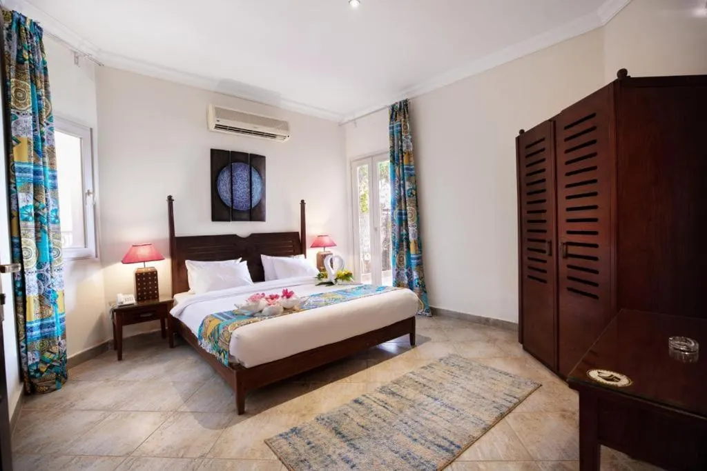 Bedroom in Golden Ocean Marina Hotel