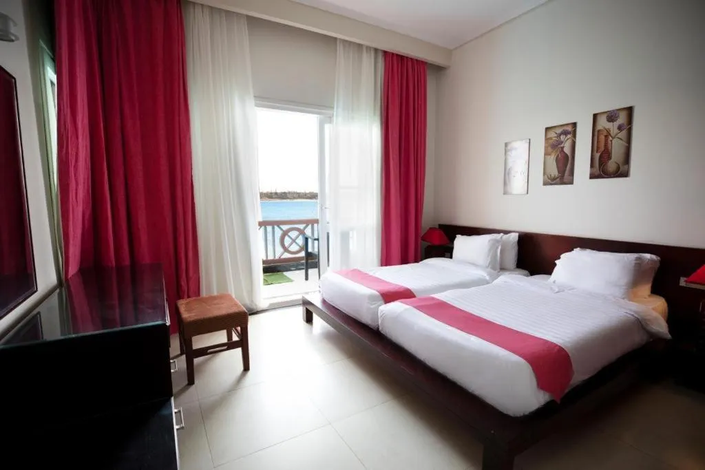 Bed in Golden Ocean Marina Hotel