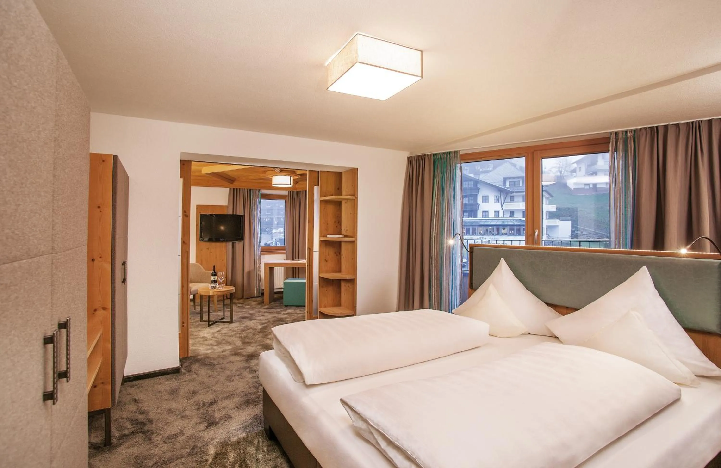 Photo of the whole room, Bed in Hotel Piz Buin