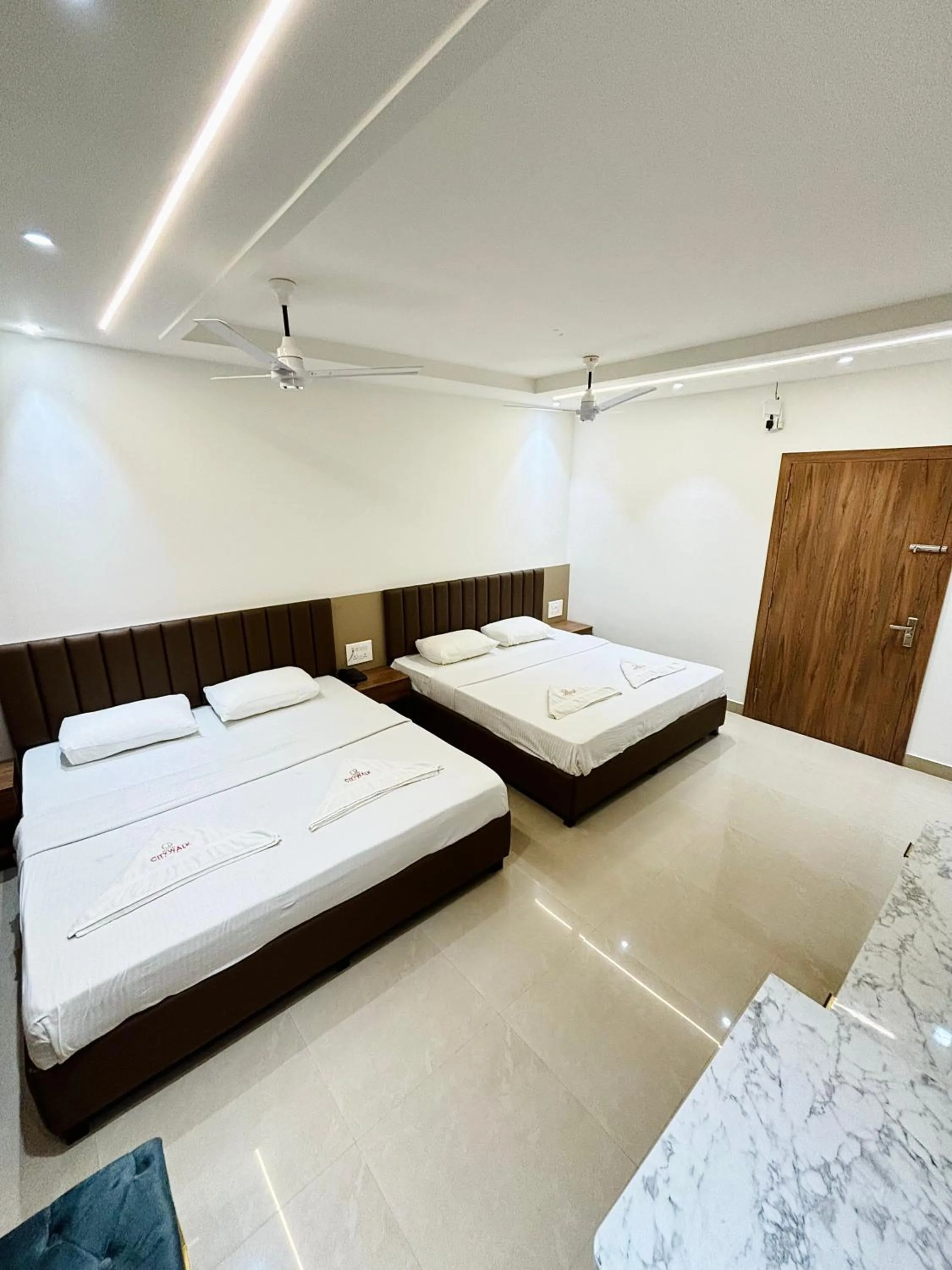 Bed in Hotel Citywalk Residency