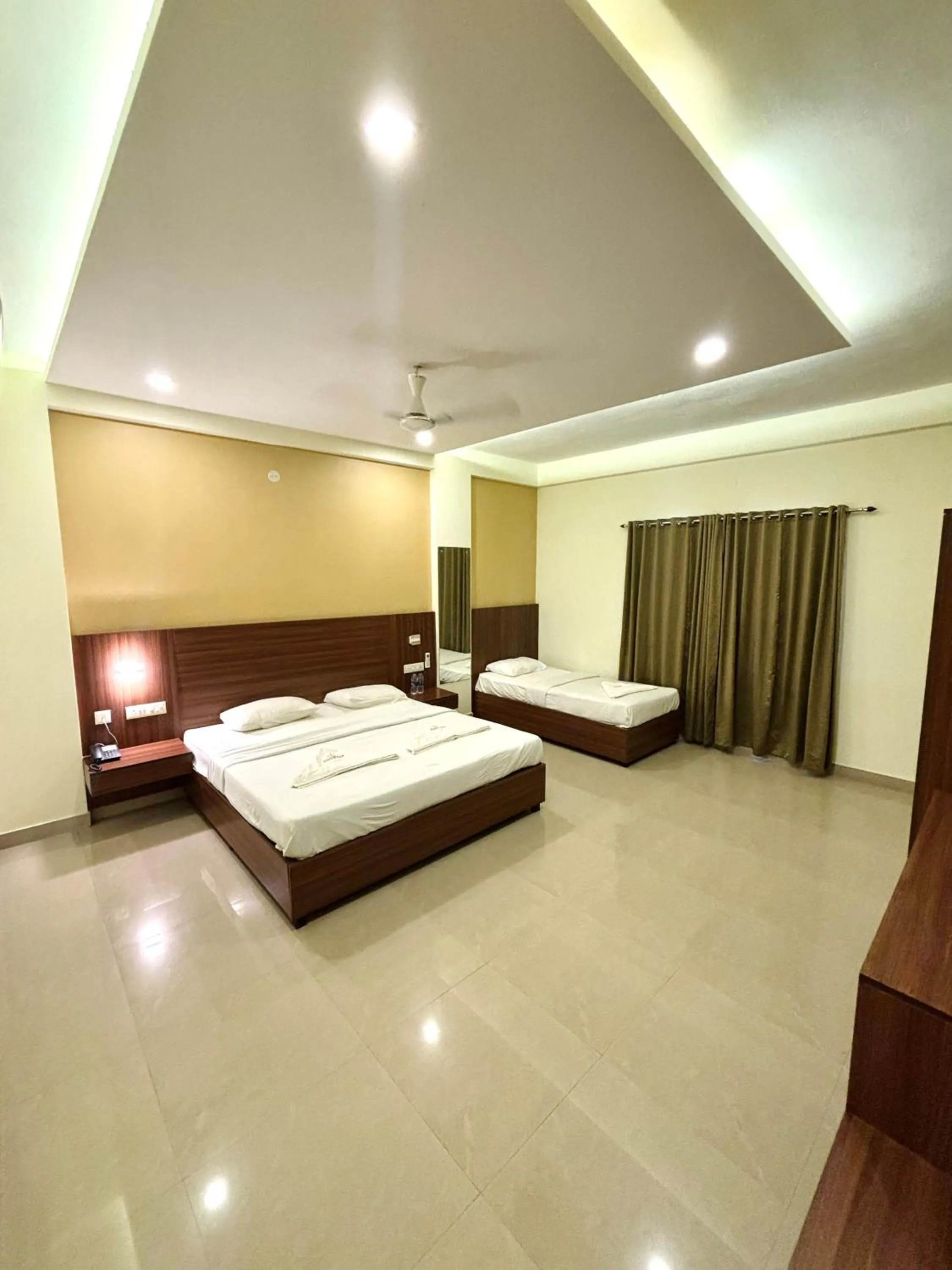 Bed in Hotel Citywalk Residency