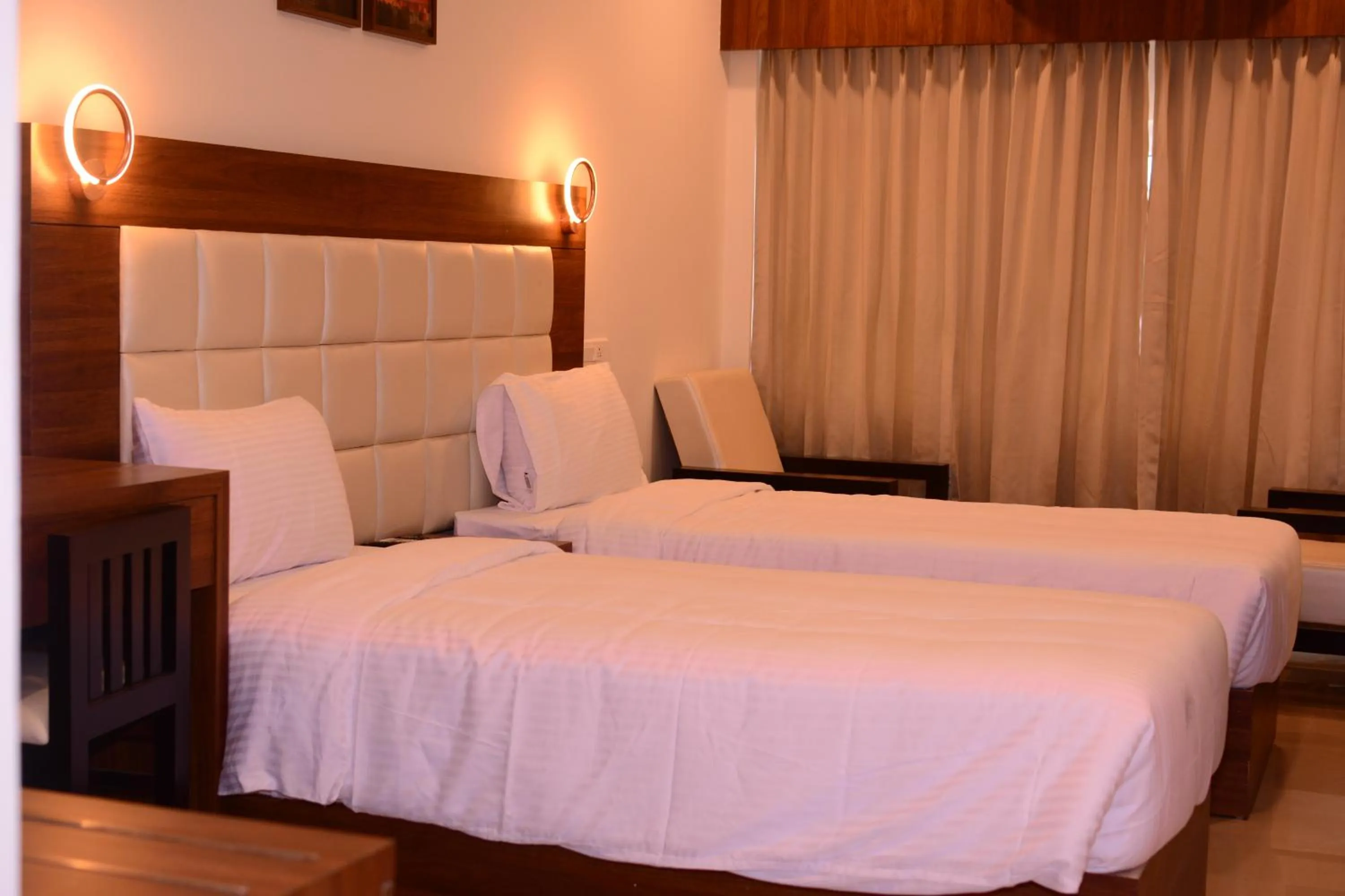 Bed in Alhind Calicut Tower