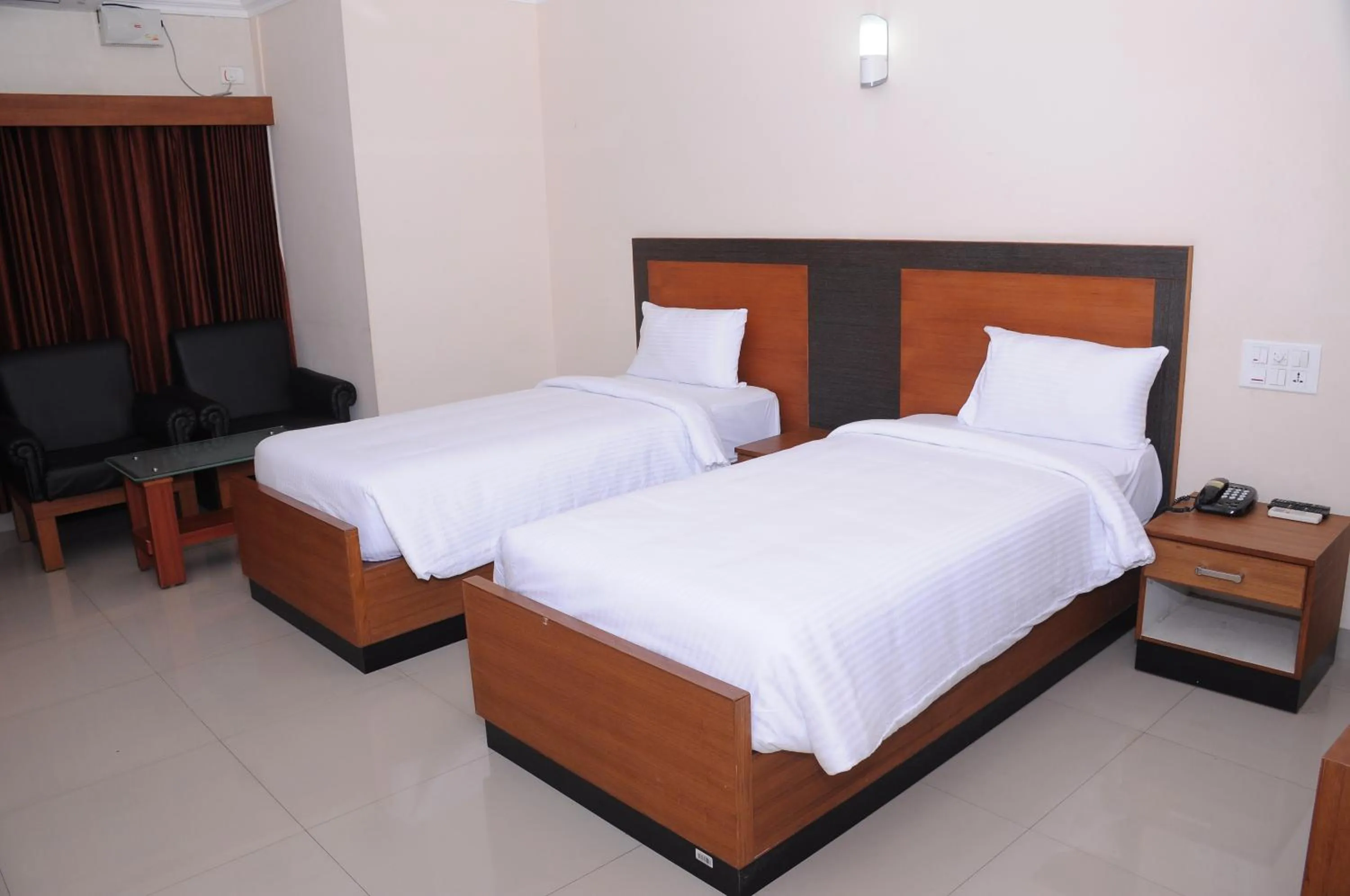 Bed in Alhind Calicut Tower